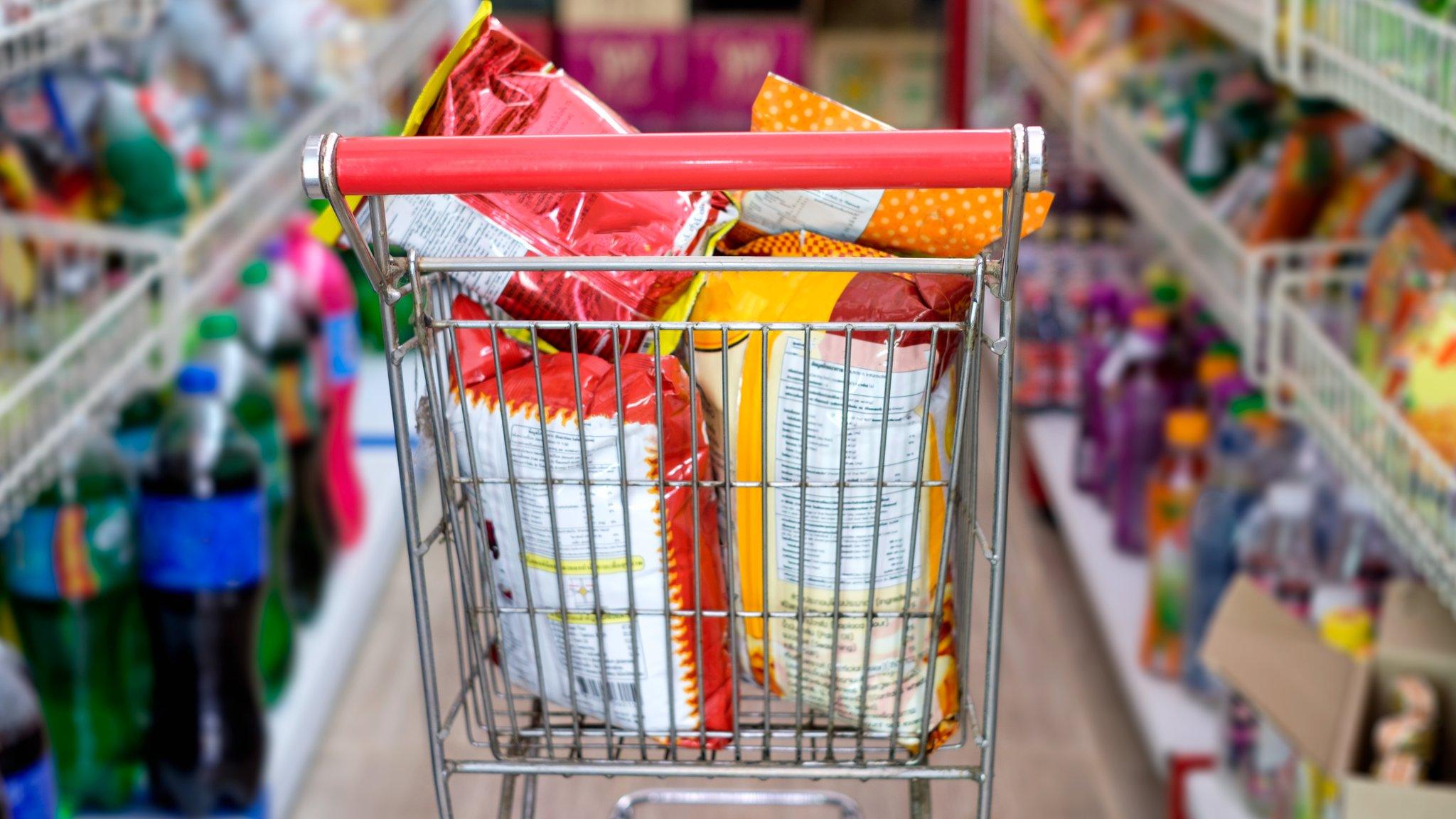 Supermarket trolley full of multi-packs