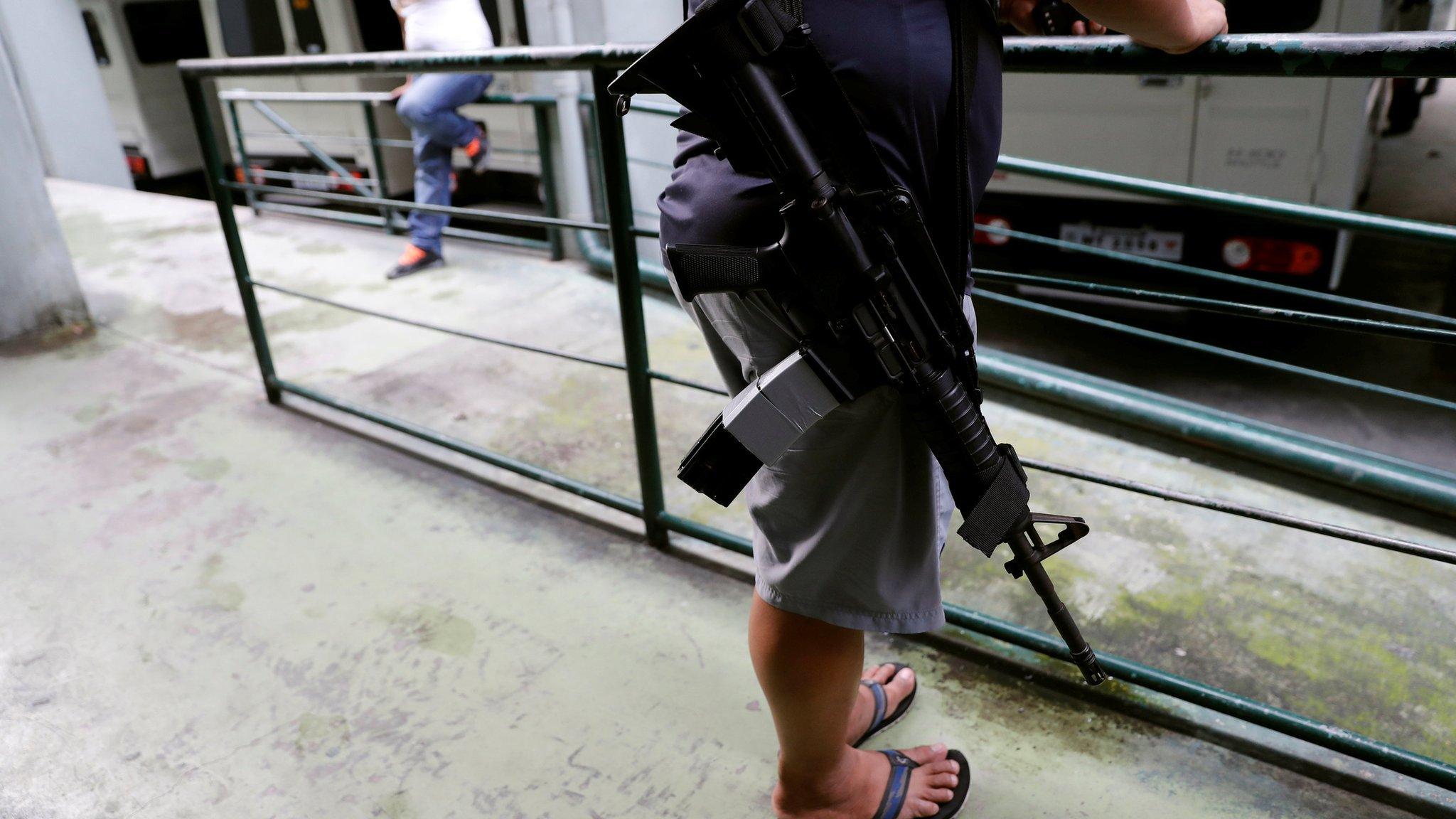 Agent of the Philippine Drugs Enforcement Agency during a surveillance operation in Manila, Philippines, December 10, 2017.