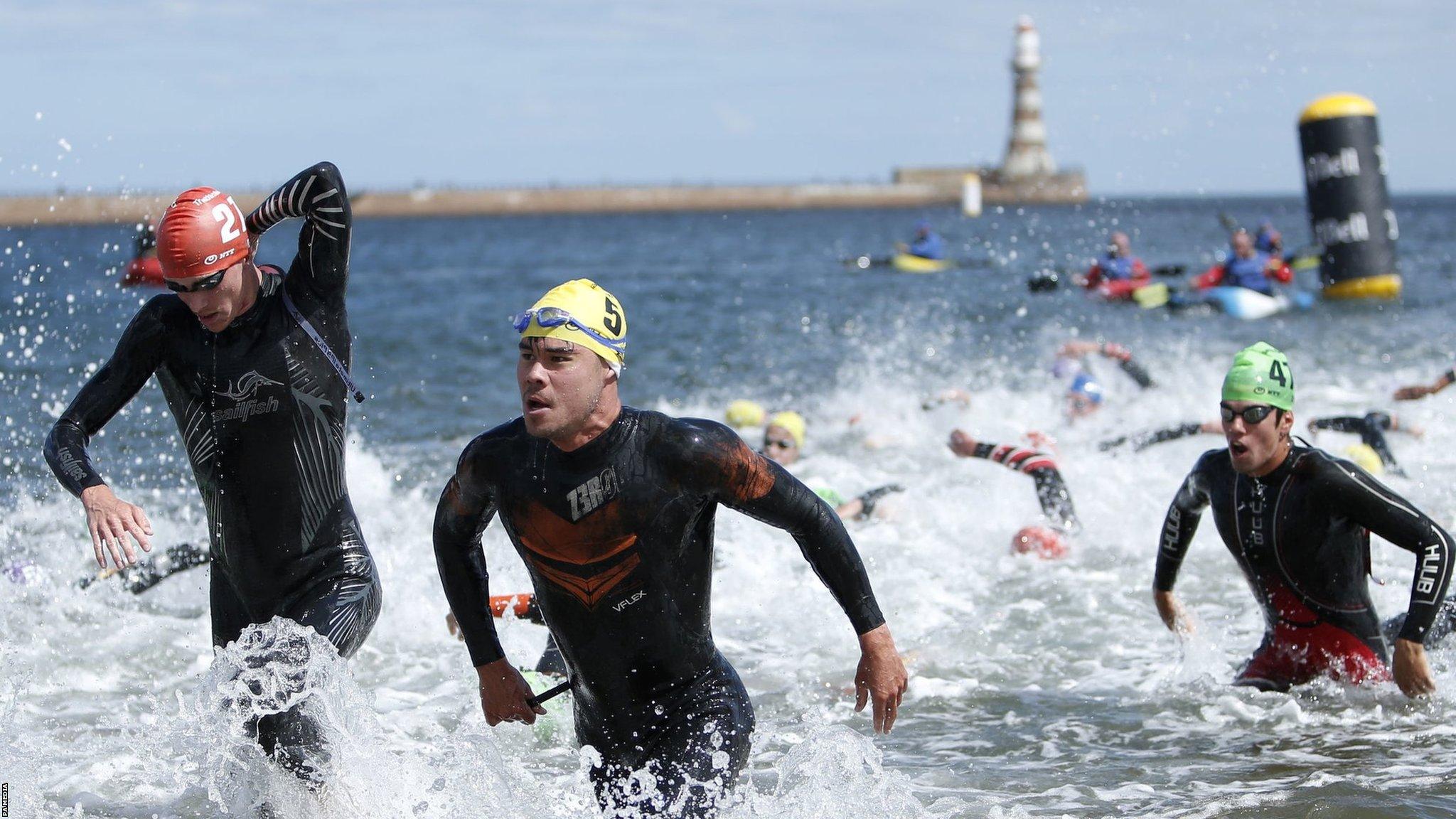 Competitors at the 2023 World Triathlon Series event at Roker Beach, Sunderland.