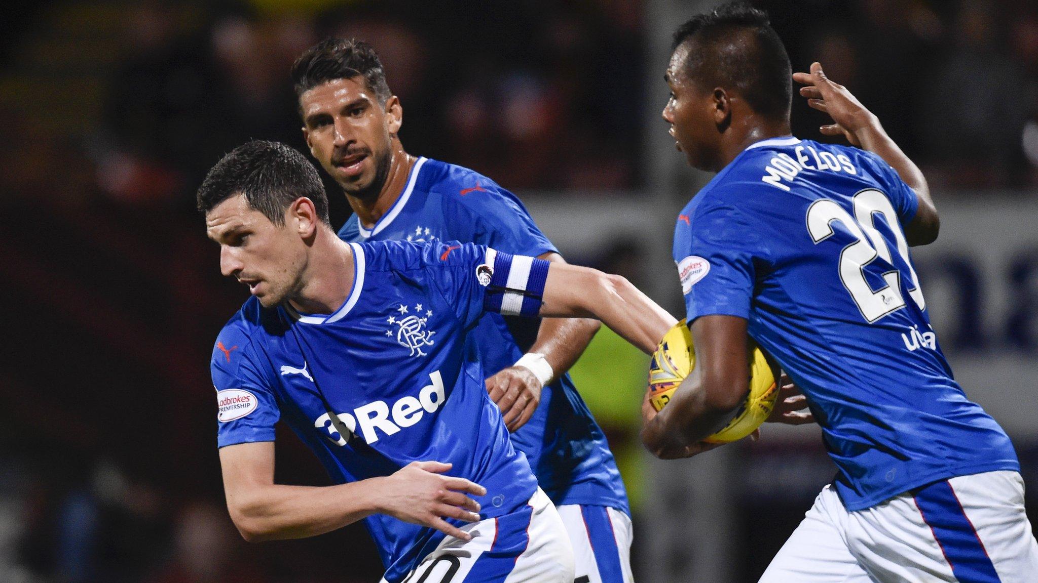 Graham Dorrans is congratulated by Eduardo Herrera and Alfredo Morelos