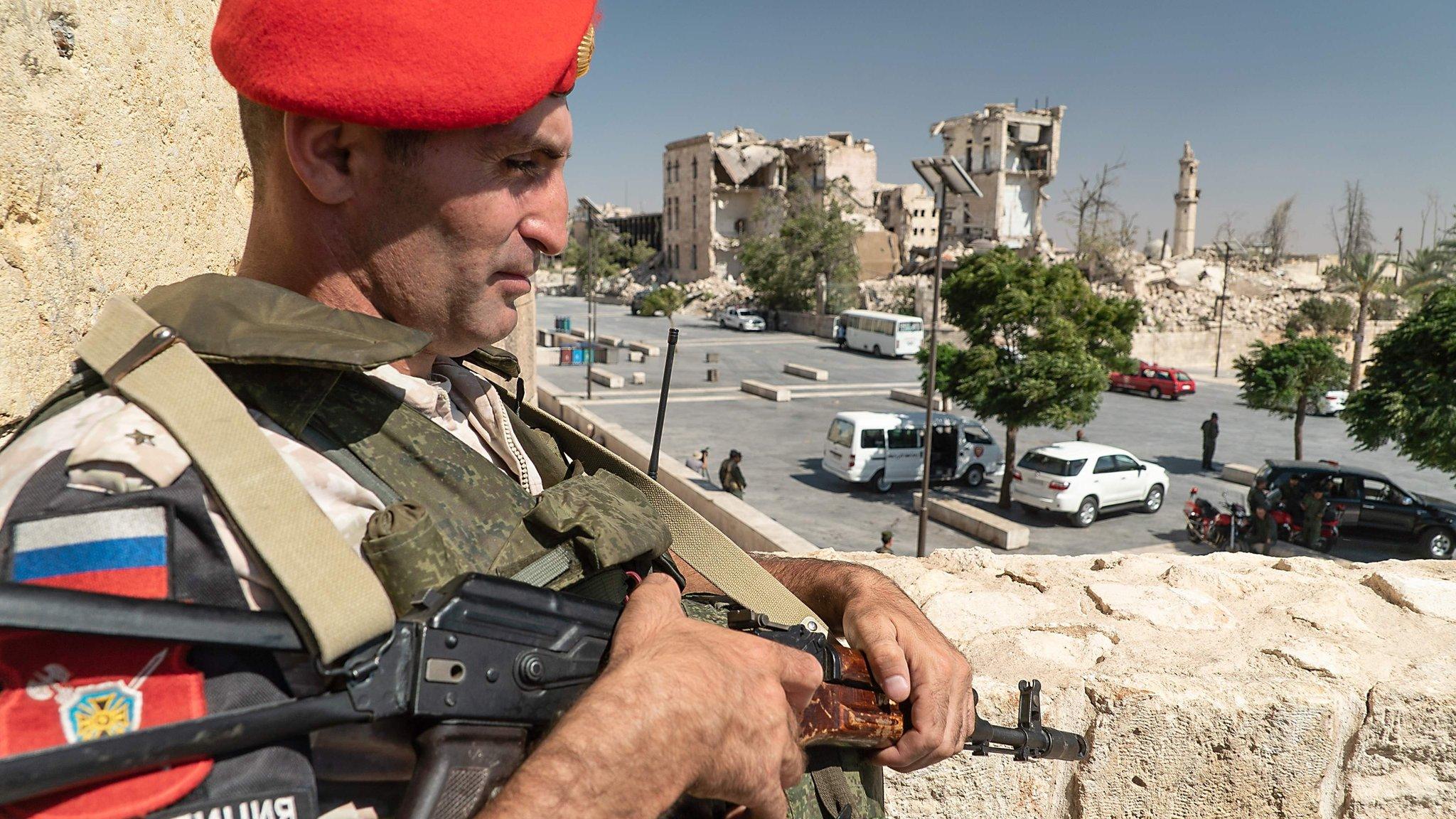 Russian military police officer stands in the citadel of Aleppo, Syria (16 August 2018)