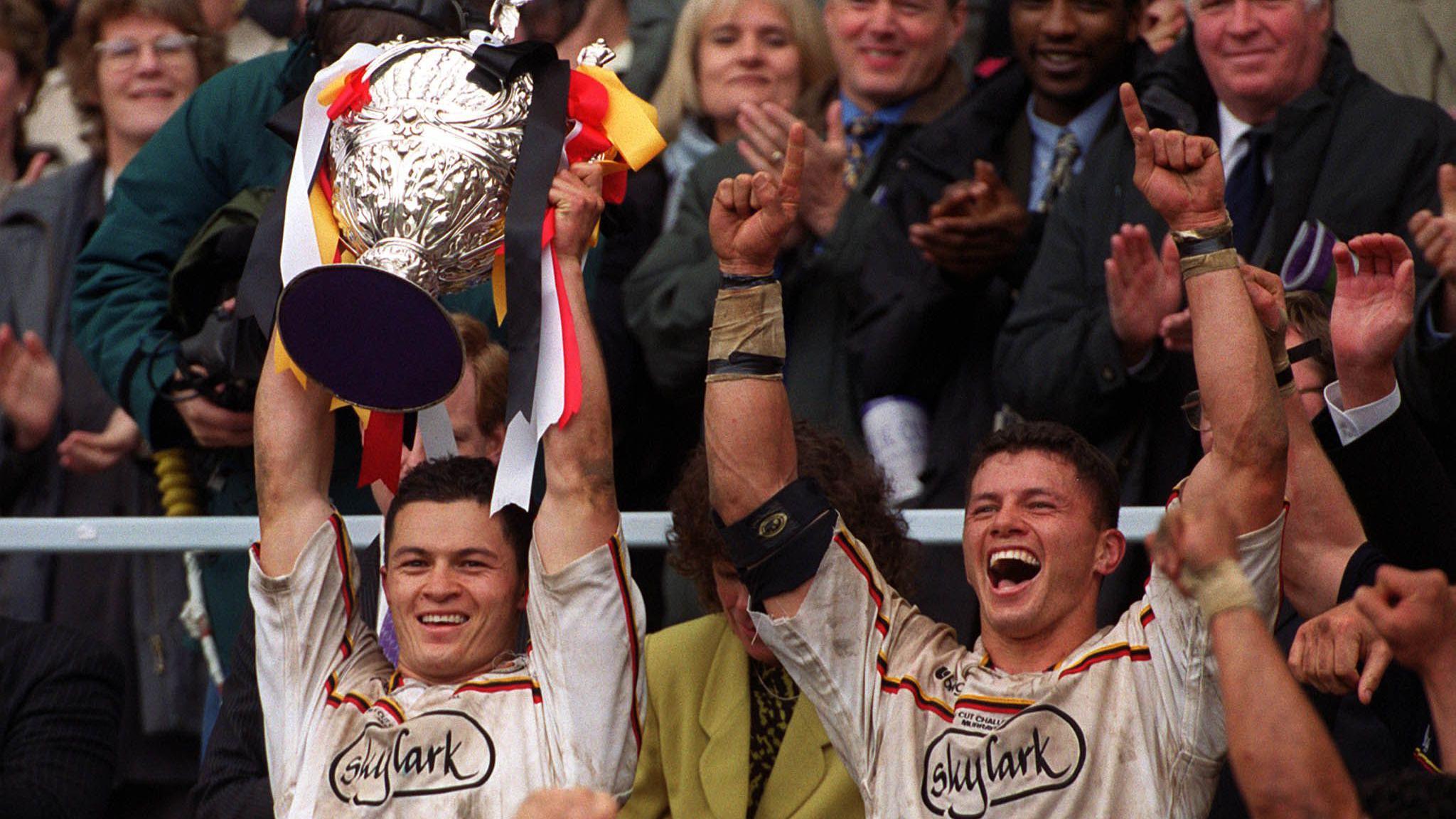 Robbie and brother Henry Paul lift the Challenge Cup with Bradford Bulls in 2000