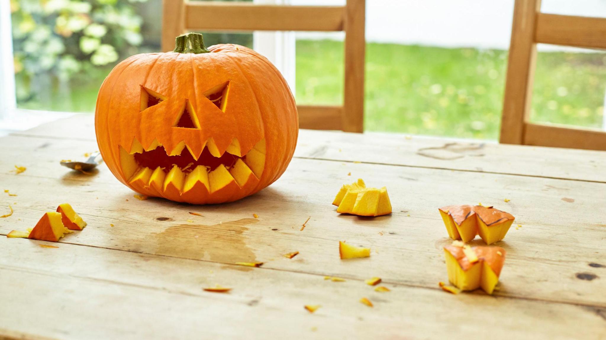 pumpkin carved with a spooky face