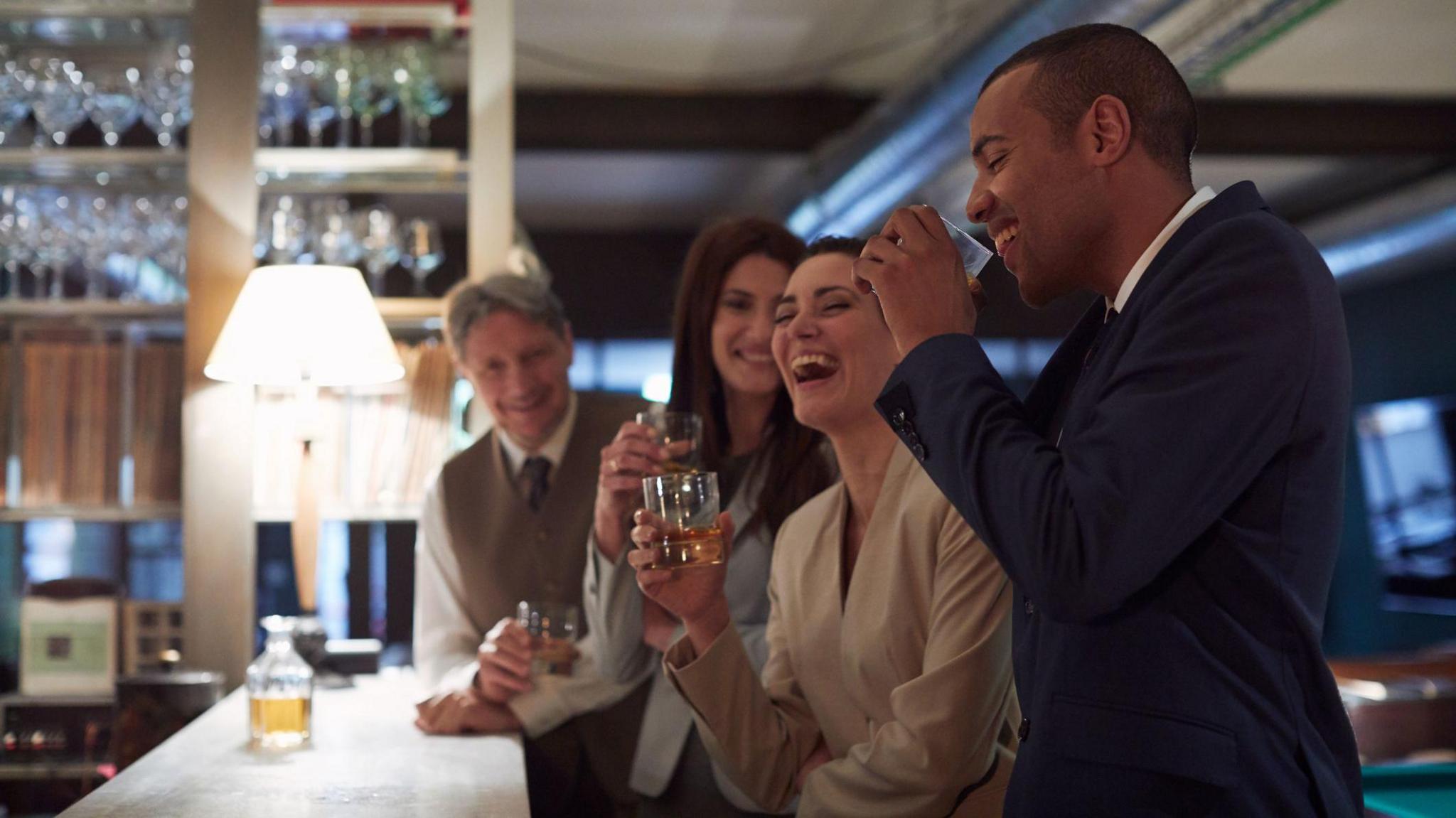 Business people drinking in a bar