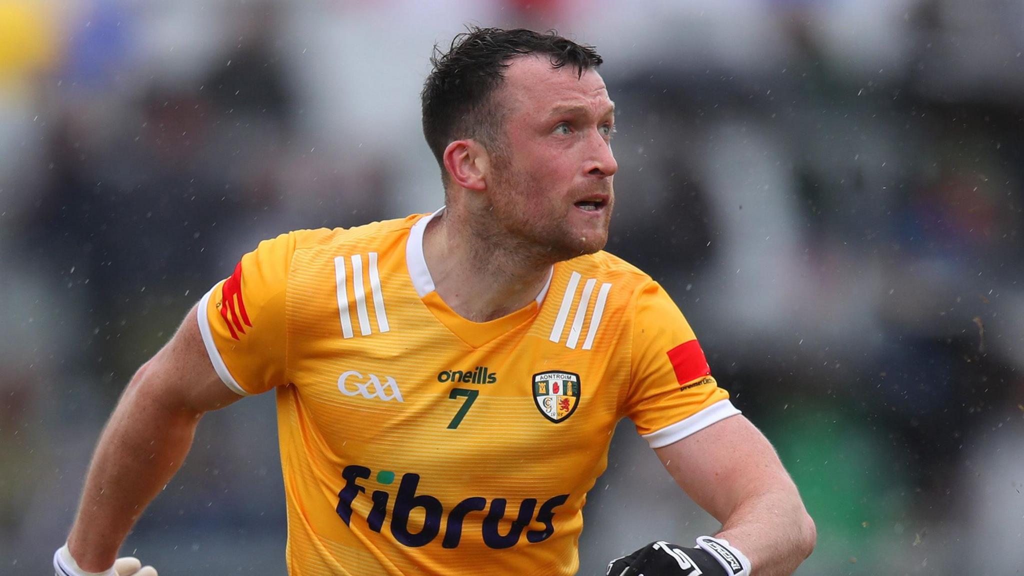 Dermot McAleese of Antrim scores against London