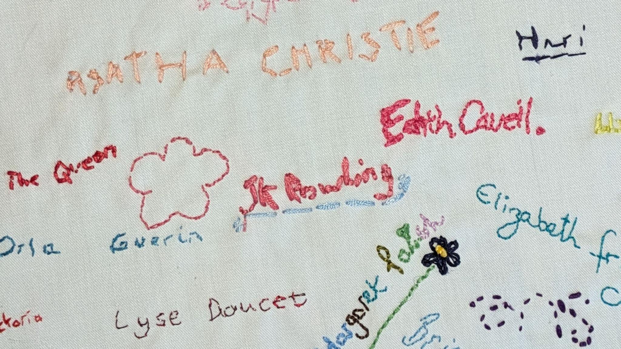 A zoomed in photo of the artwork shows various names of women such as JK Rowling, Elizabeth Fry and Agatha Christie
