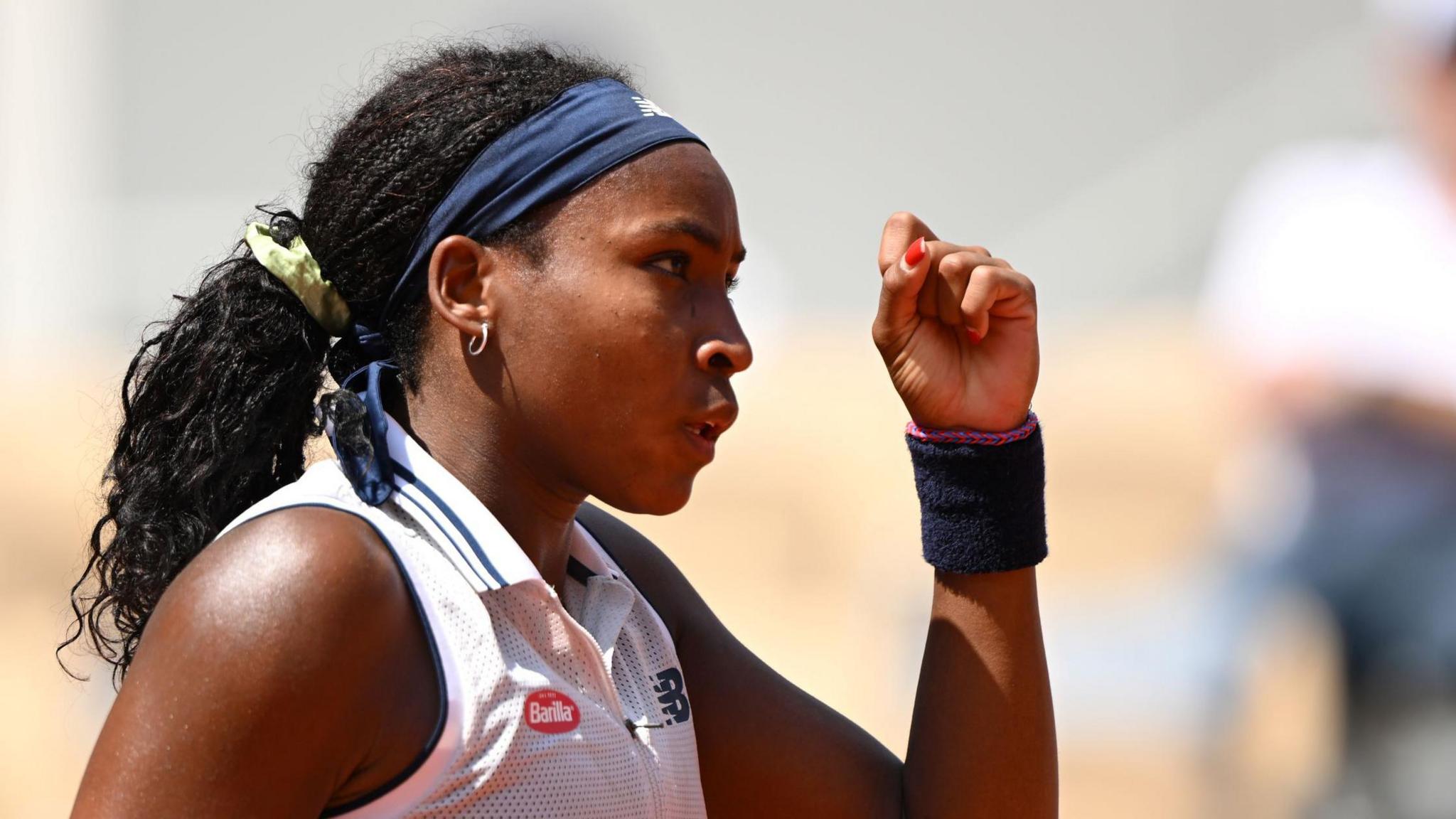 Coco Gauff clenches her fist in celebration