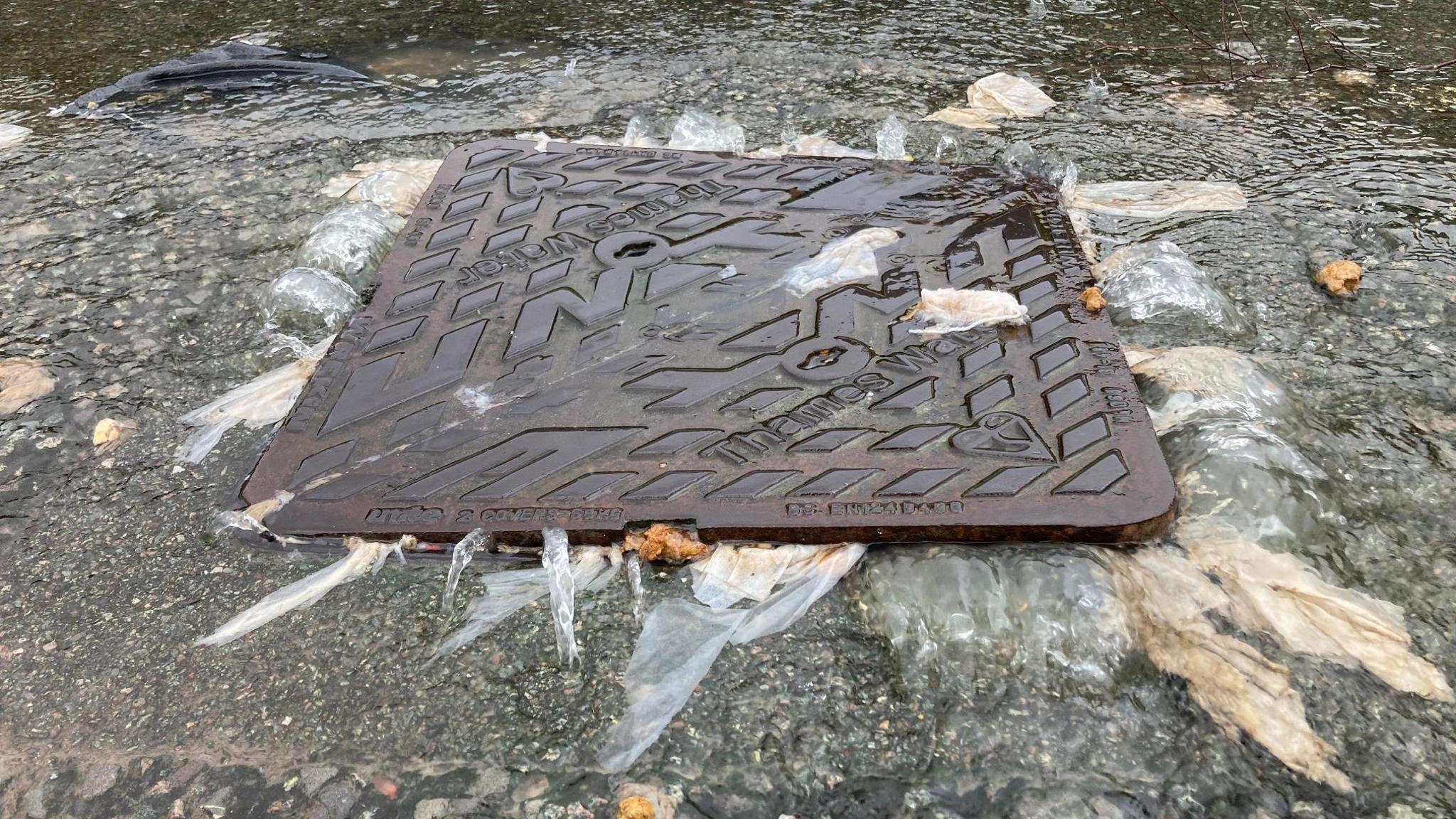 Sewage spilling out of a drain in Lambourne