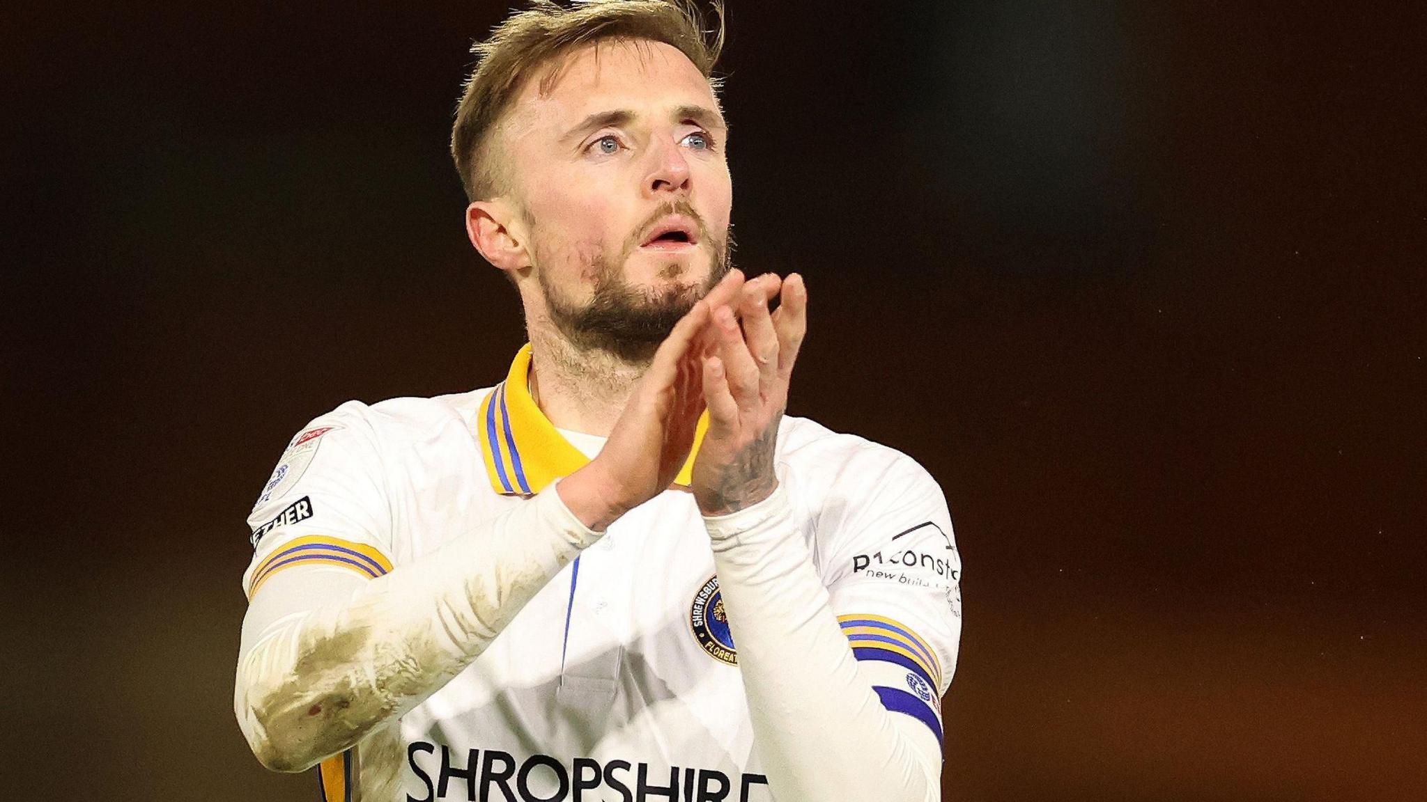 Carl Winchester applauds the travelling Shrewsbury Town fans after the 1-0 defeat at Orient