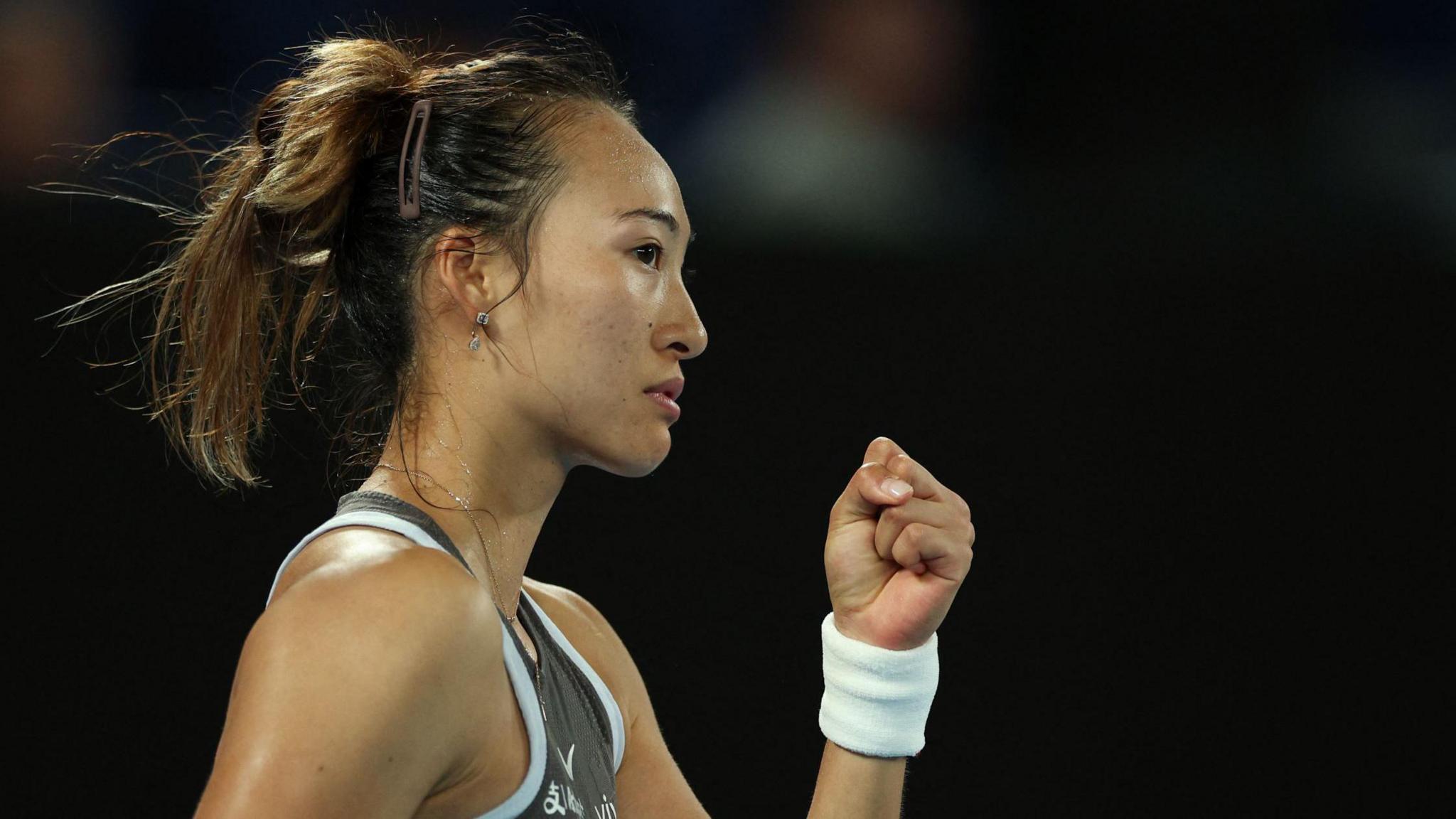 Zheng Qinwen clenches her fist during her 2025 Australian Open first round