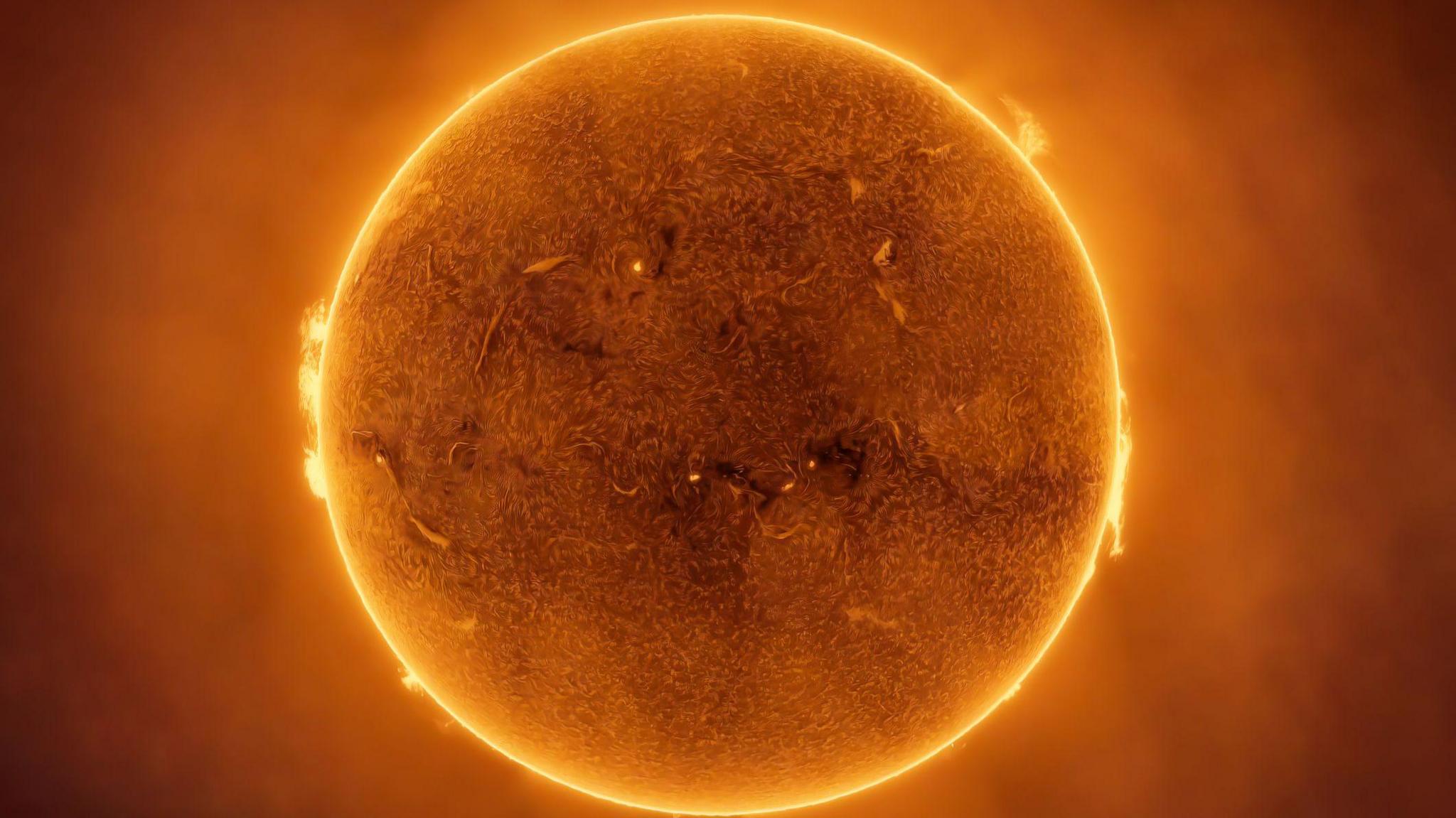 Close-up of the Sun emitting solar flares.