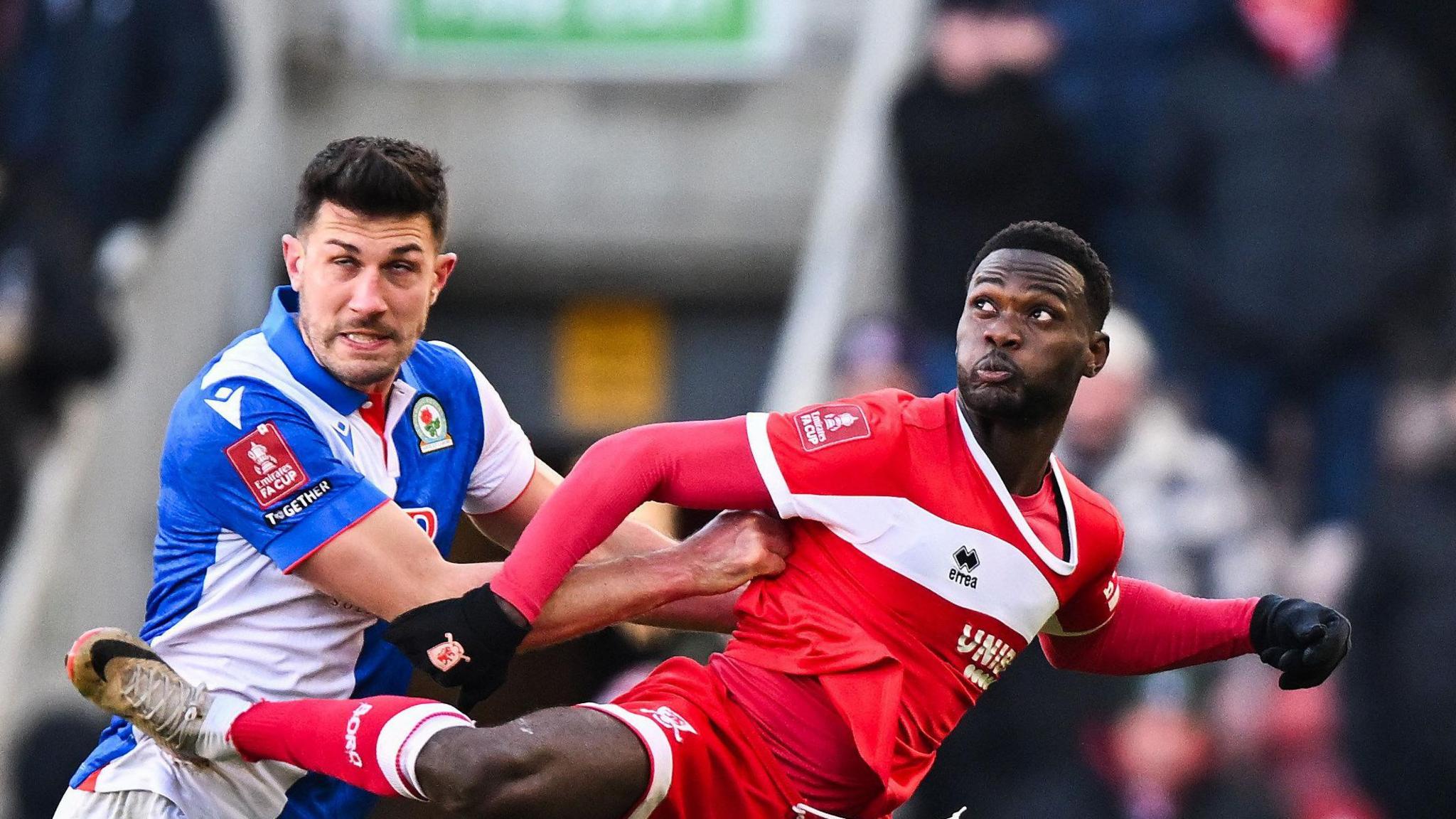 Middlesbrough's Emmanuel Latte Lath battling with Blackburn Rovers defender Danny Batth