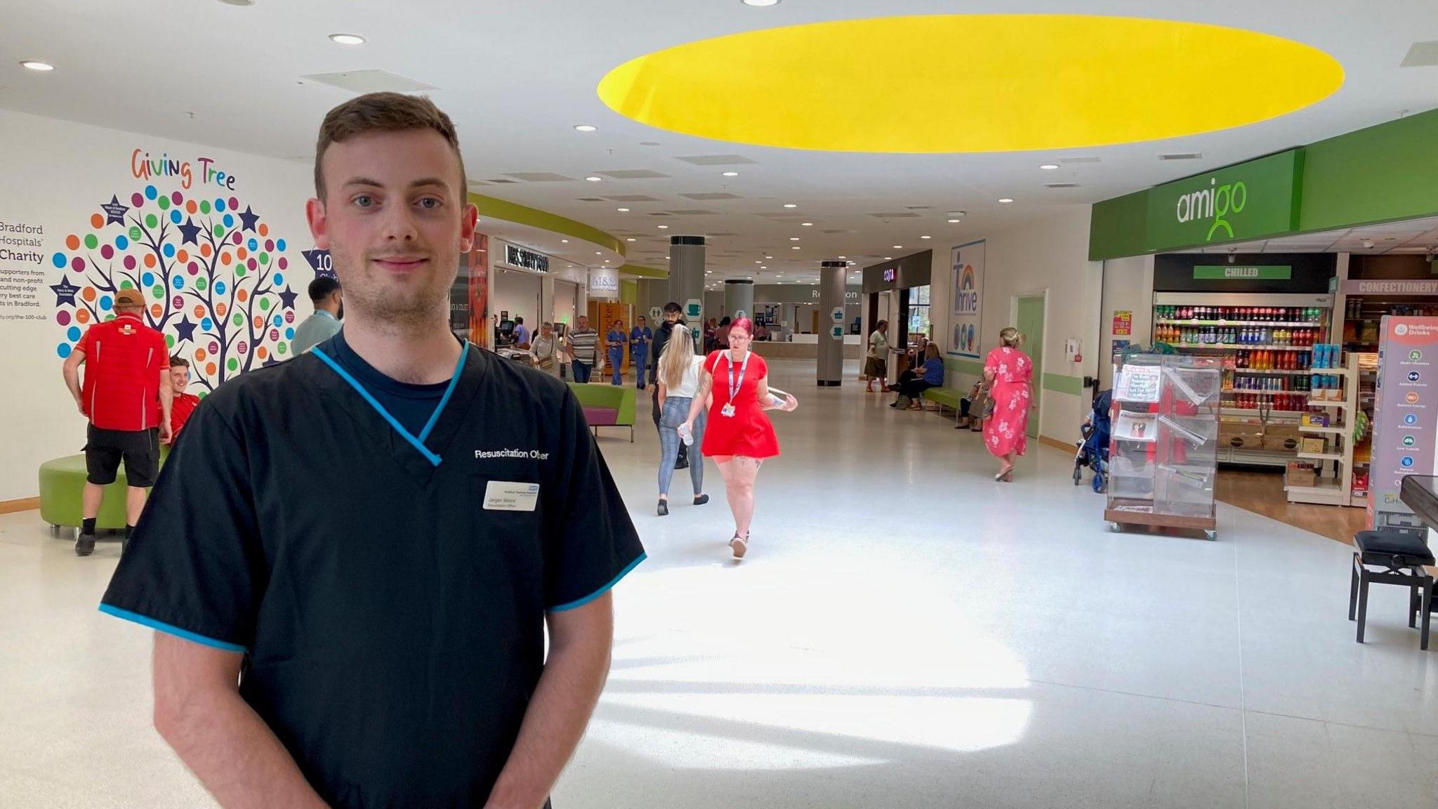 Jørgen Moore standing in the hospital's main concourse