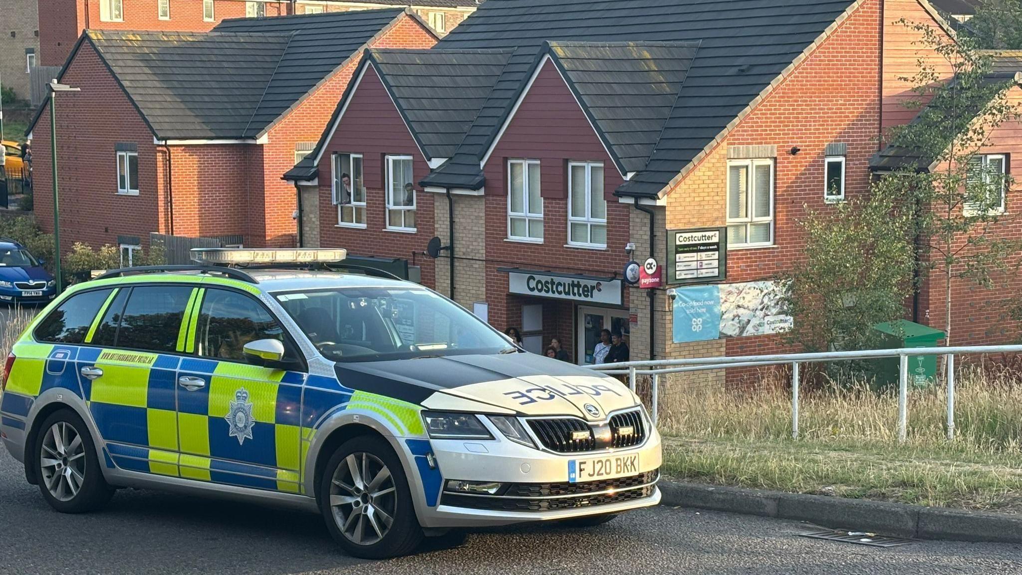 Police car parked in street