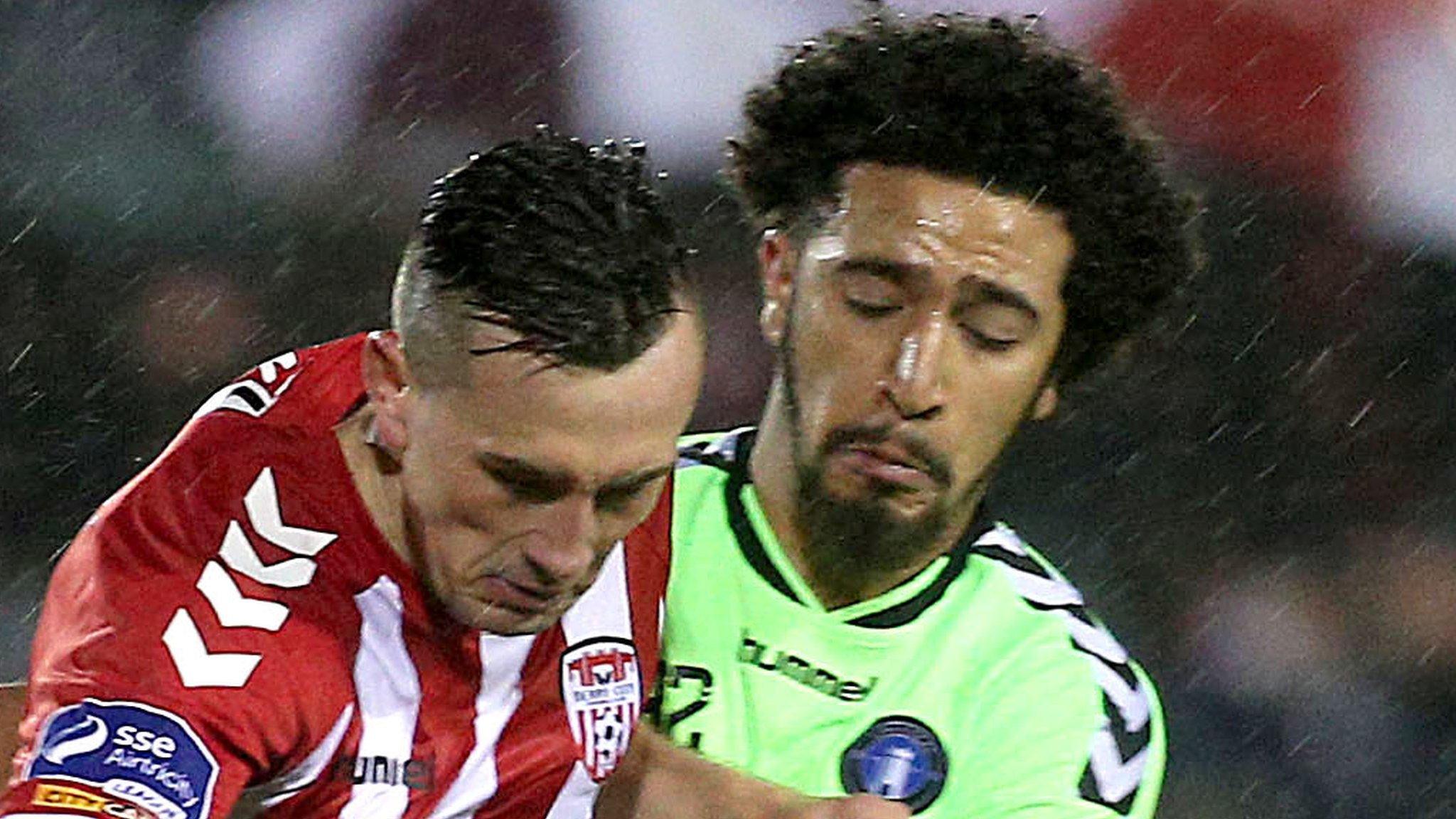 Derry City's Aaron McEneff battles with Limerick's Bastien Hery