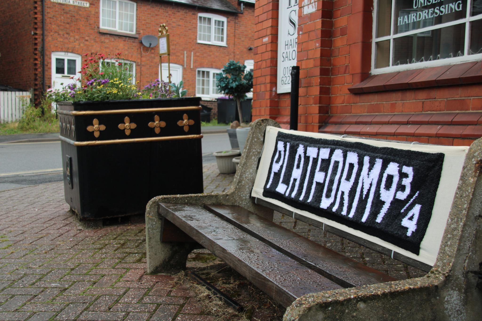 A knitted platform 9 3/4 sign 