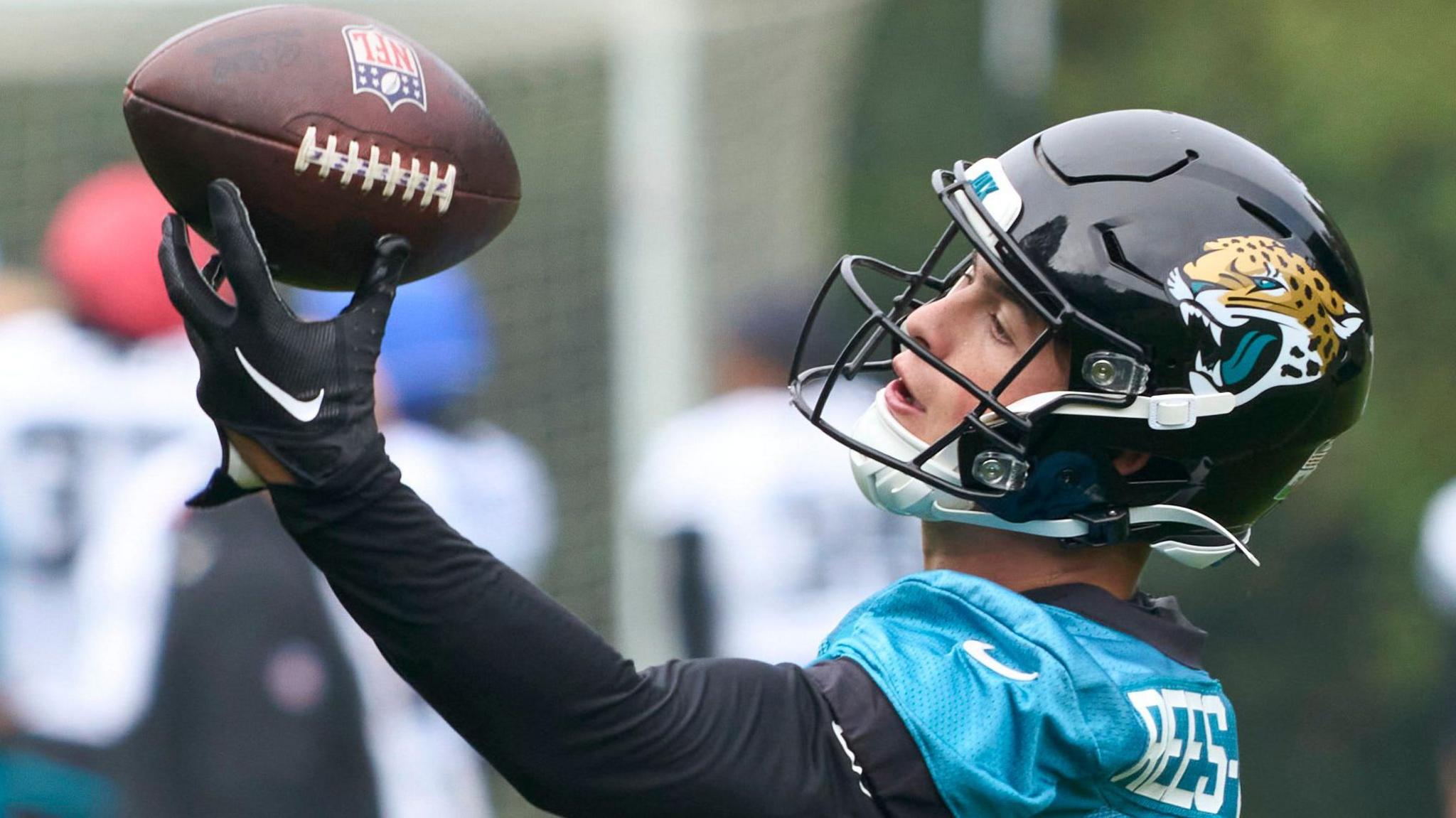 Louis Rees-Zammit catches the ball in practice for Jacksonville Jaguars