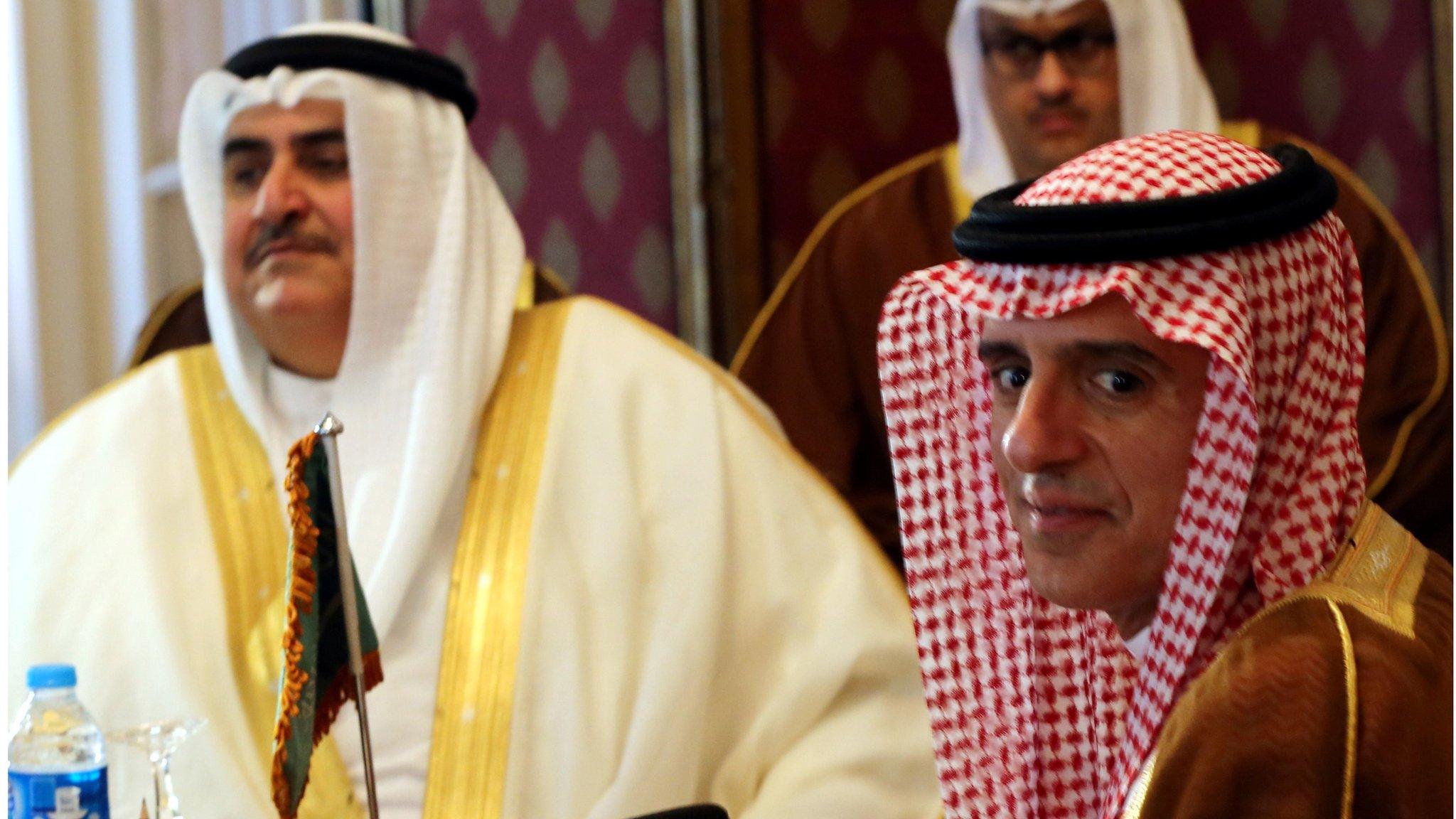 Saudi Foreign Minister Adel al-Jubeir (R) and Bahraini Foreign Minister Khalid bin Ahmed al-Khalifa (L), look on during a meeting with UAE Foreign Minister Abdullah bin Zayed al-Nahyan (Not Pictured), and Egyptian Foreign Minister Sameh Shoukry (Not Pictured), to discuss the diplomatic situation with Qatar, in Cairo, Egypt, July, 5 2017.