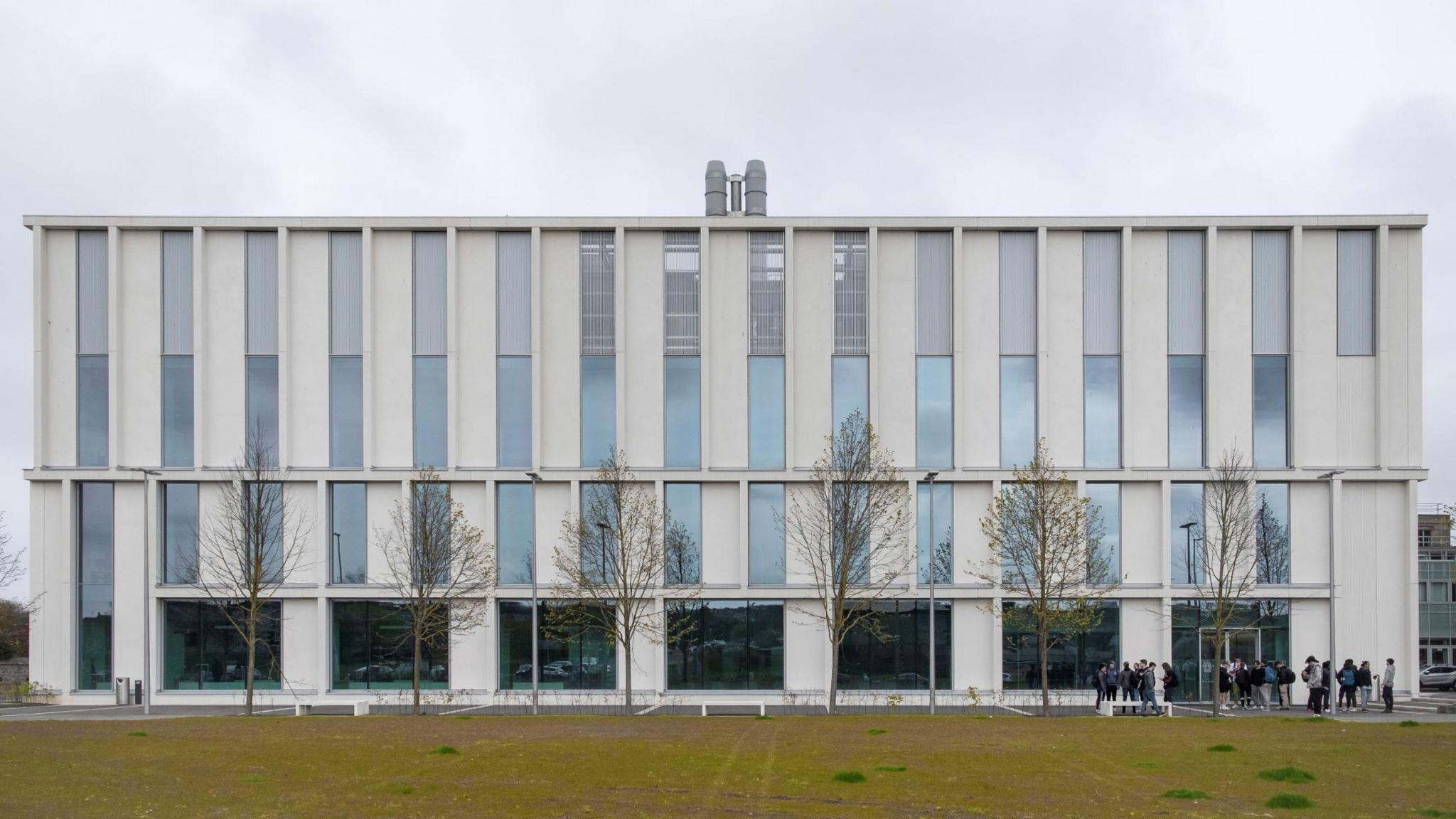 From the outside, the science and teaching hub looks like a white box, four storeys high with lots of windows 