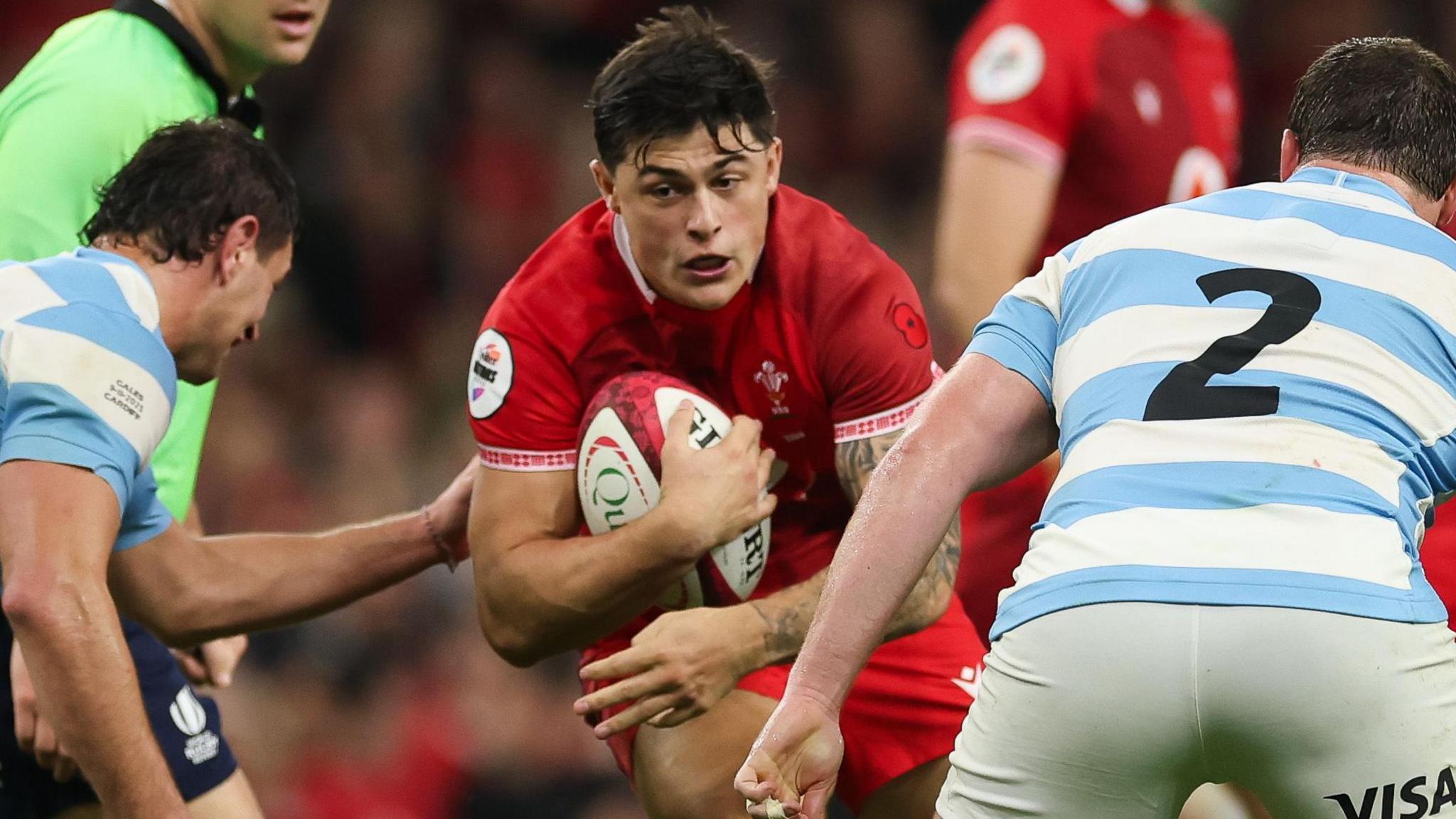 Wales wing Louis Rees-Zammit carries the ball against Argentina
