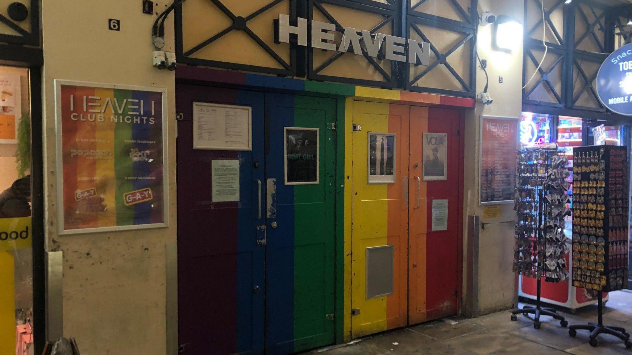 A picture showing the Pride coloured-doors of Heaven 