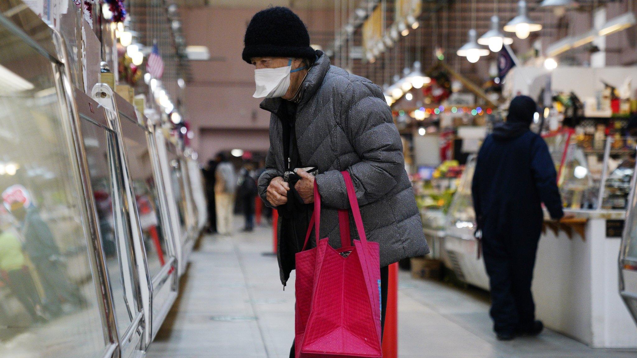 Shoppers in Eastern Market, Washington DC, in Washington DC, USA, 10 December 2021. An inflation report released 10 December by the US Labour Department shows inflation rose at its highest rate in 40 years.