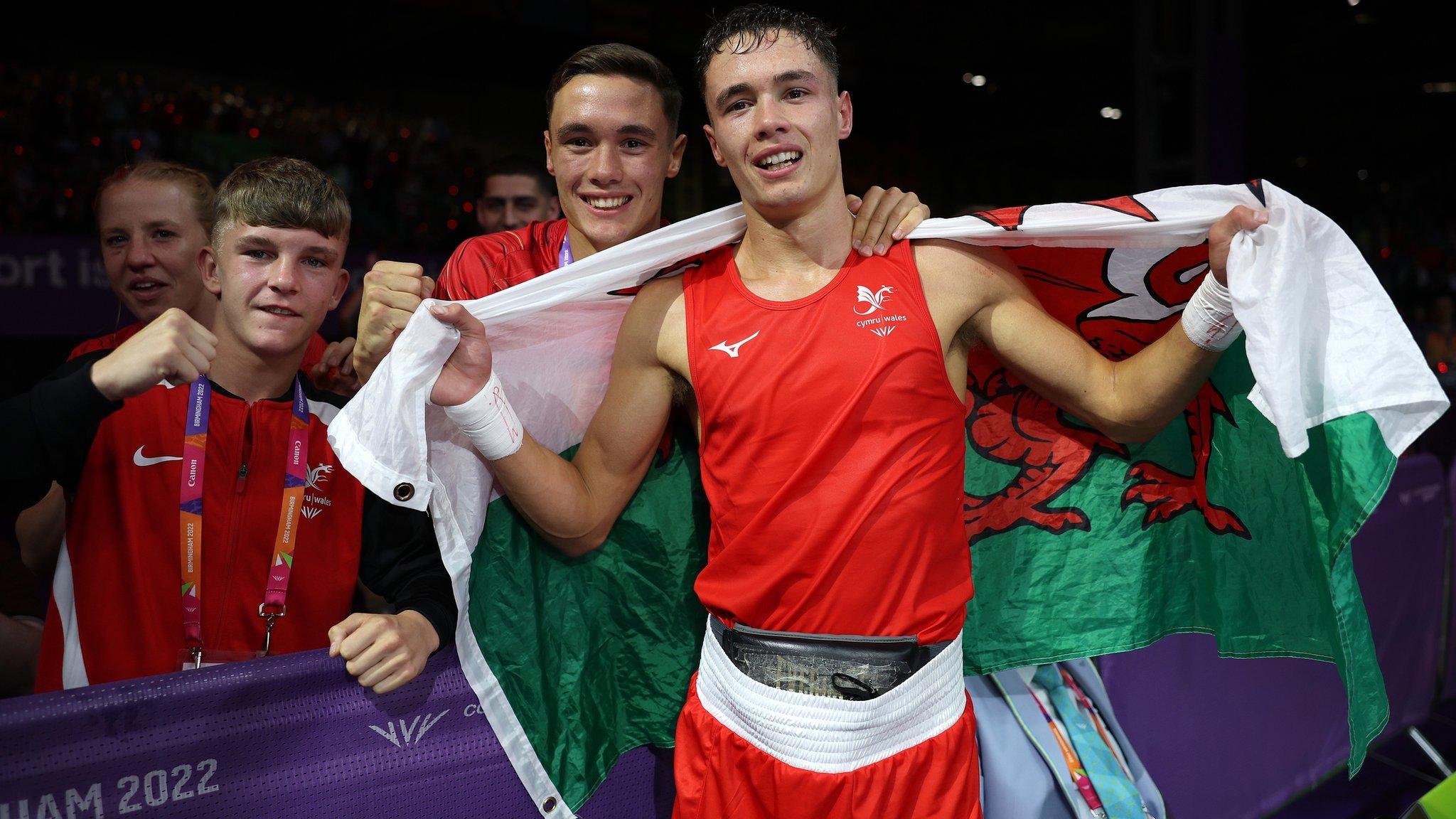 Team Wales boxers Ioan Croft (R), Garan Croft (C) and Owain Harris-Allan (L) celebrate their record medal haul in Birmingham