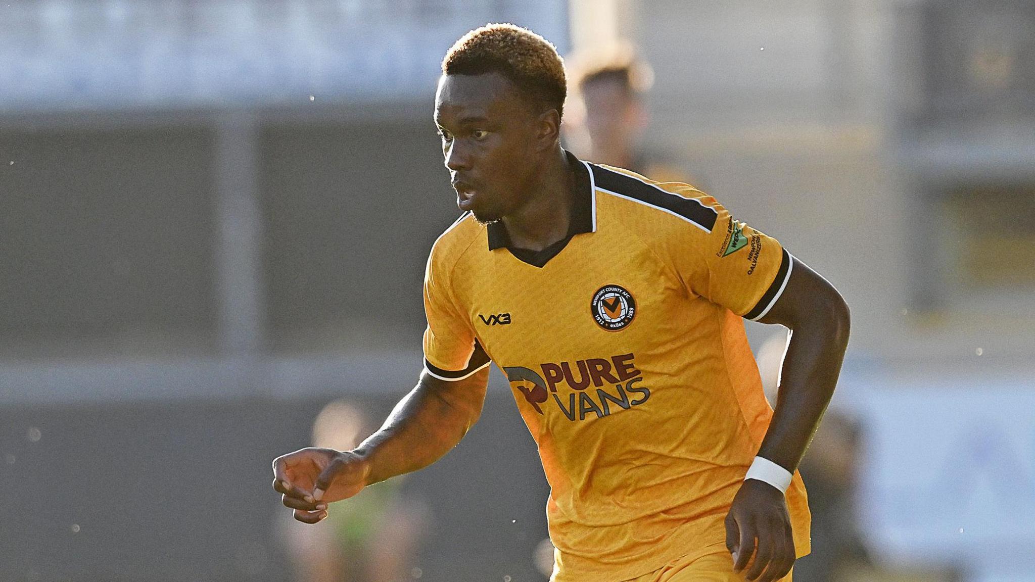 Shaquille Gwengwe in action for Newport County