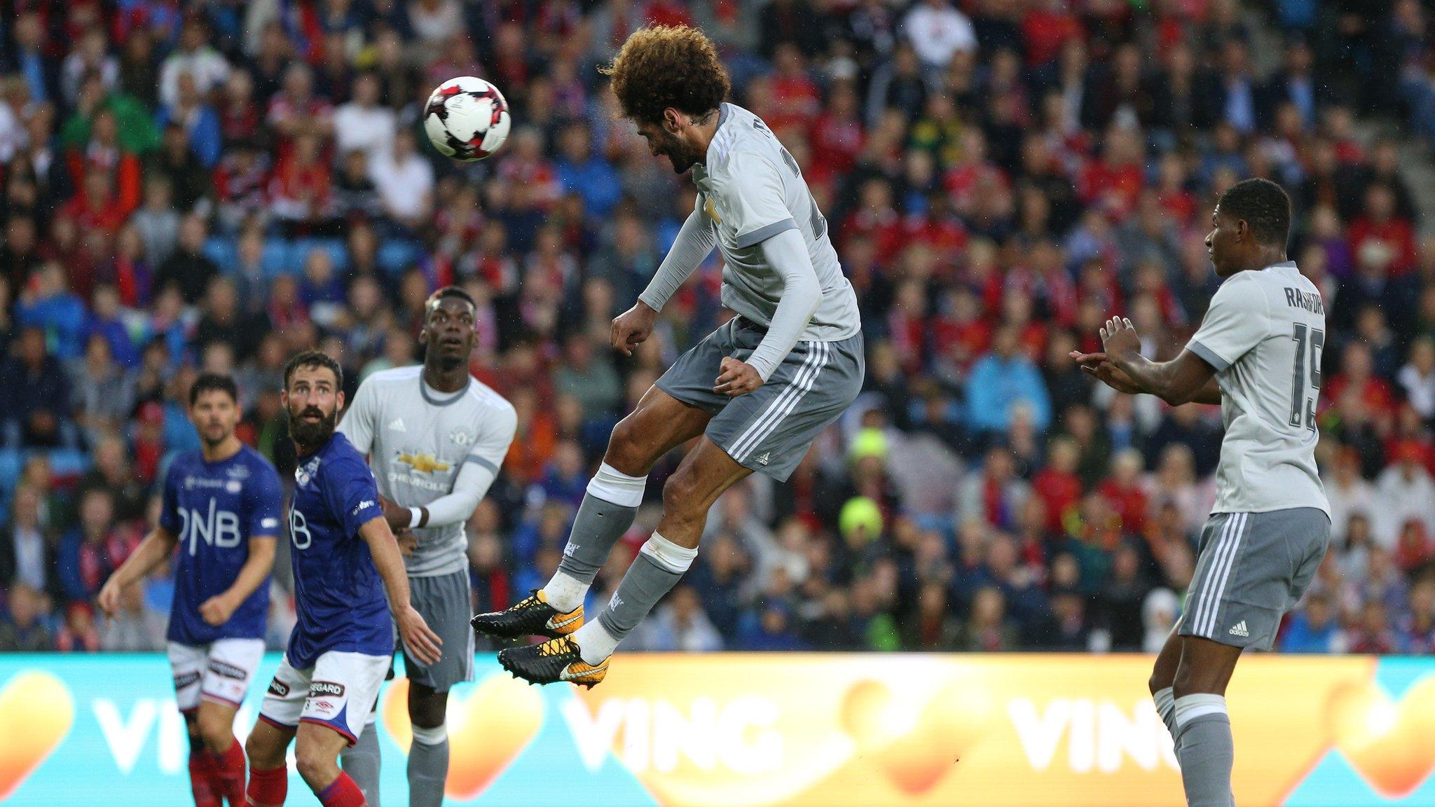 Marouane Fellaini scores a header