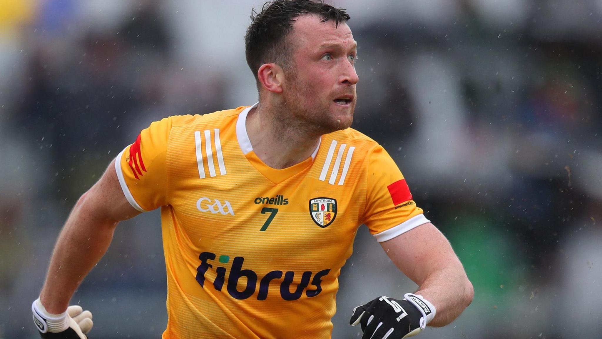 Dermot McAleese in action for Antrim at Corrigan Park