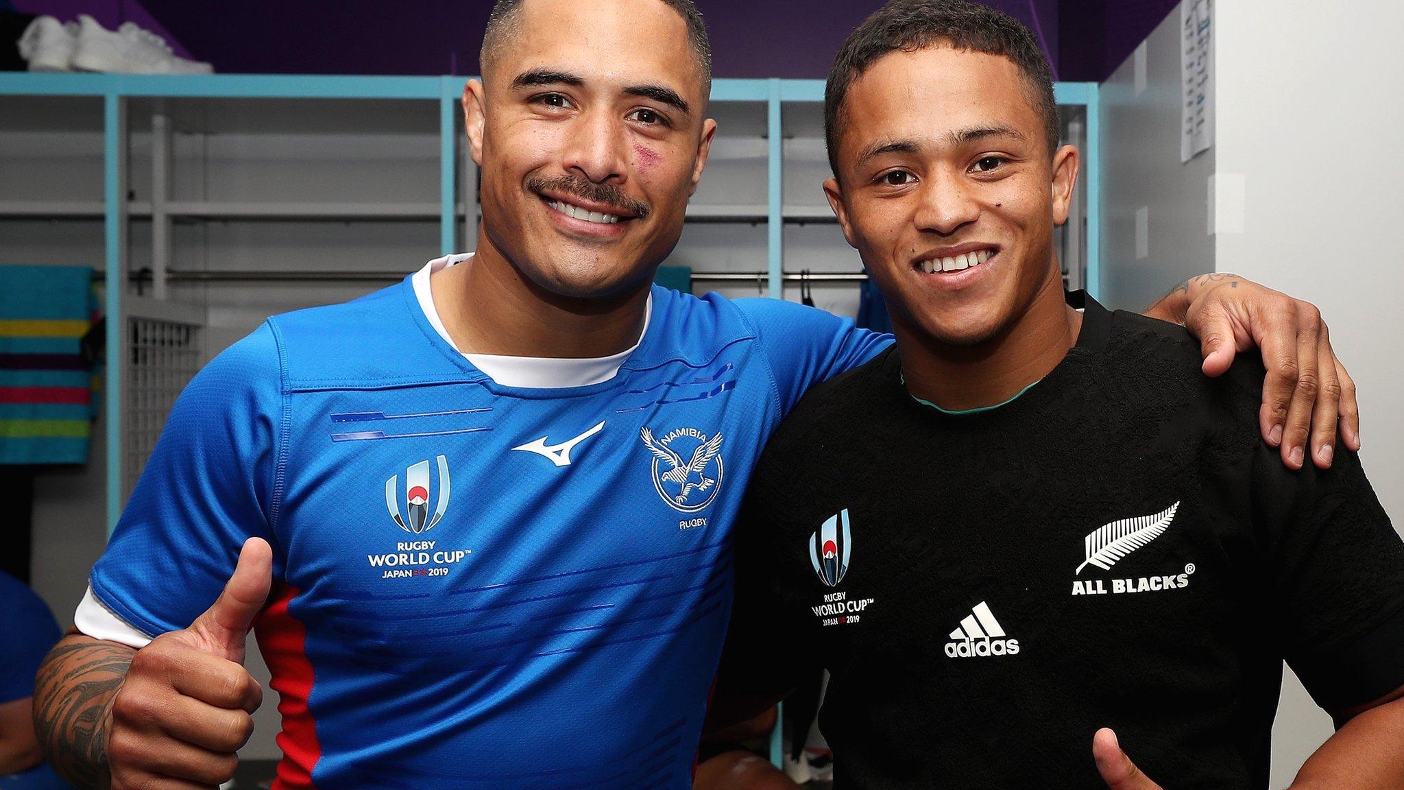 Aaron Smith of New Zealand with opposite number Helarius Kisting