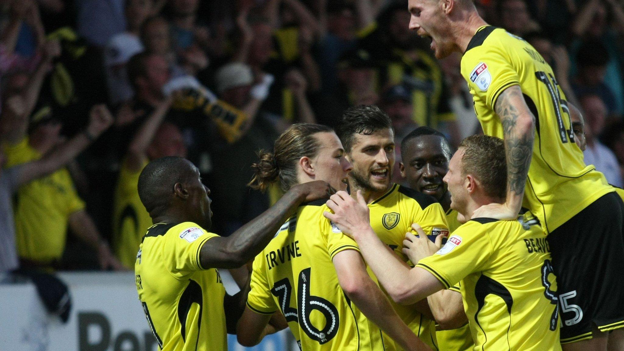 Burton players celebrate Jackson Irvine's goal against Sheffield Wednesday