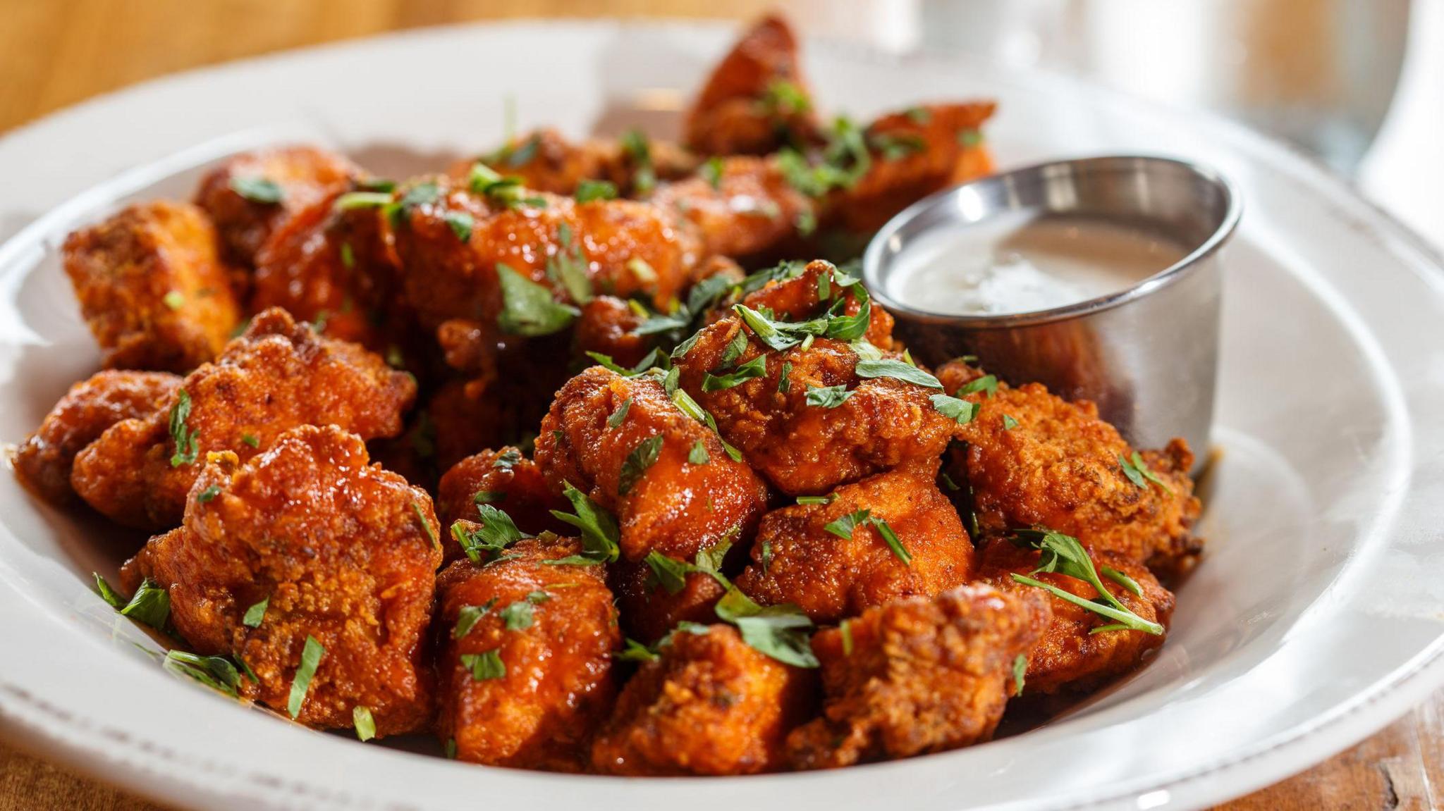 A plate of boneless chicken wings