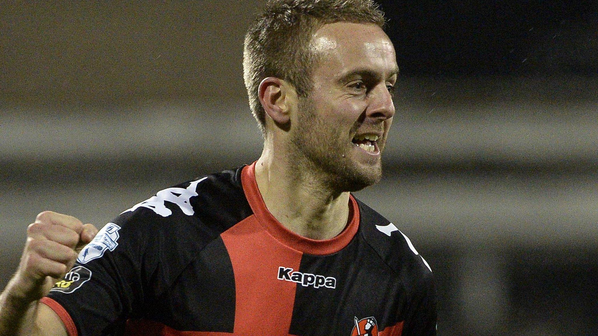 Richard Clarke celebrates scoring for Crusaders