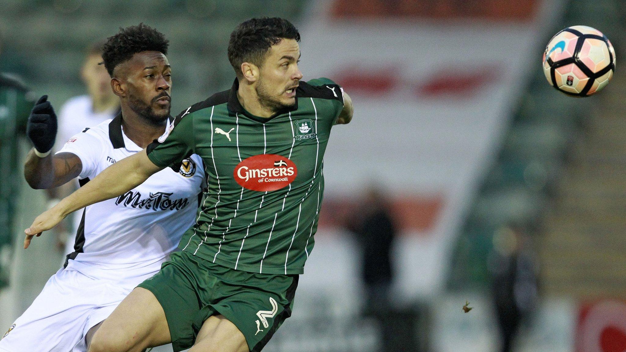 Jennison Myrie-Williams of Newport County in action against Gary Miller