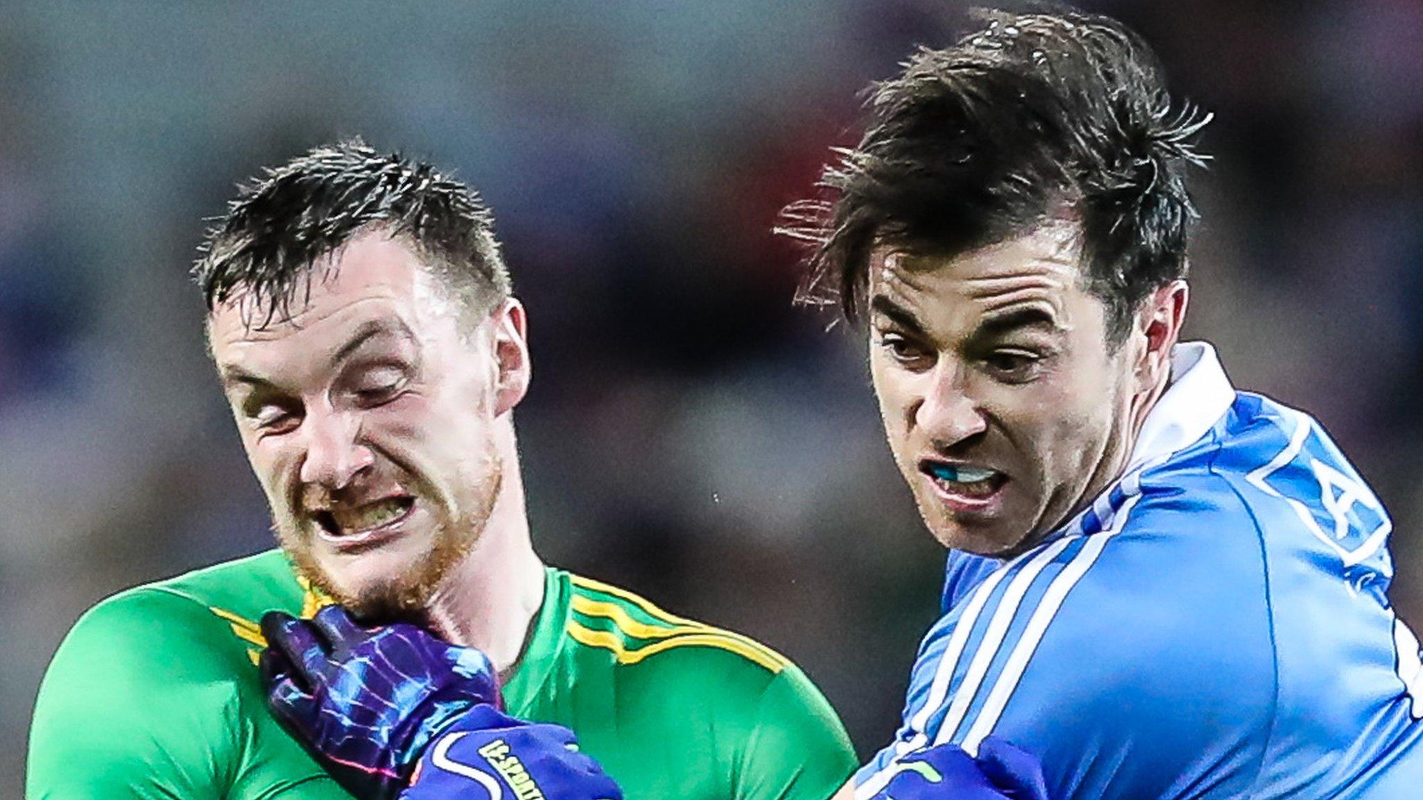 Donegal's Leo McLoone battles with Dublin's Michael Darragh Macauley