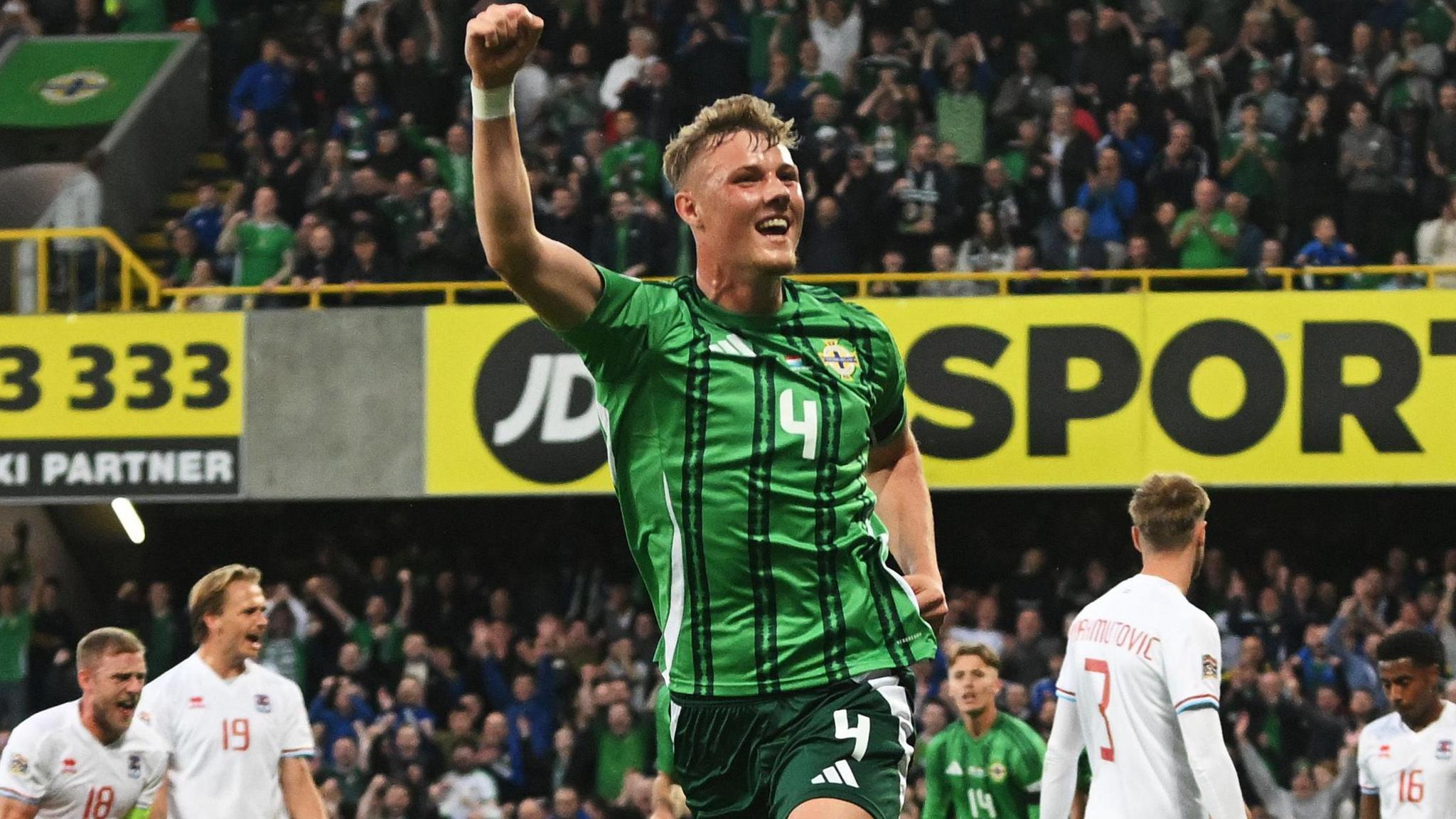 Dan Ballard celebrates scoring for Northern Ireland in the win over Belarus