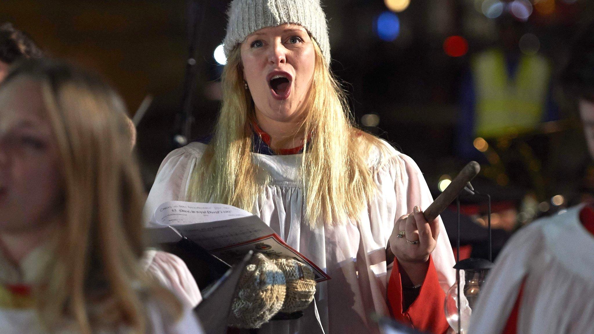 Chorister singing carols