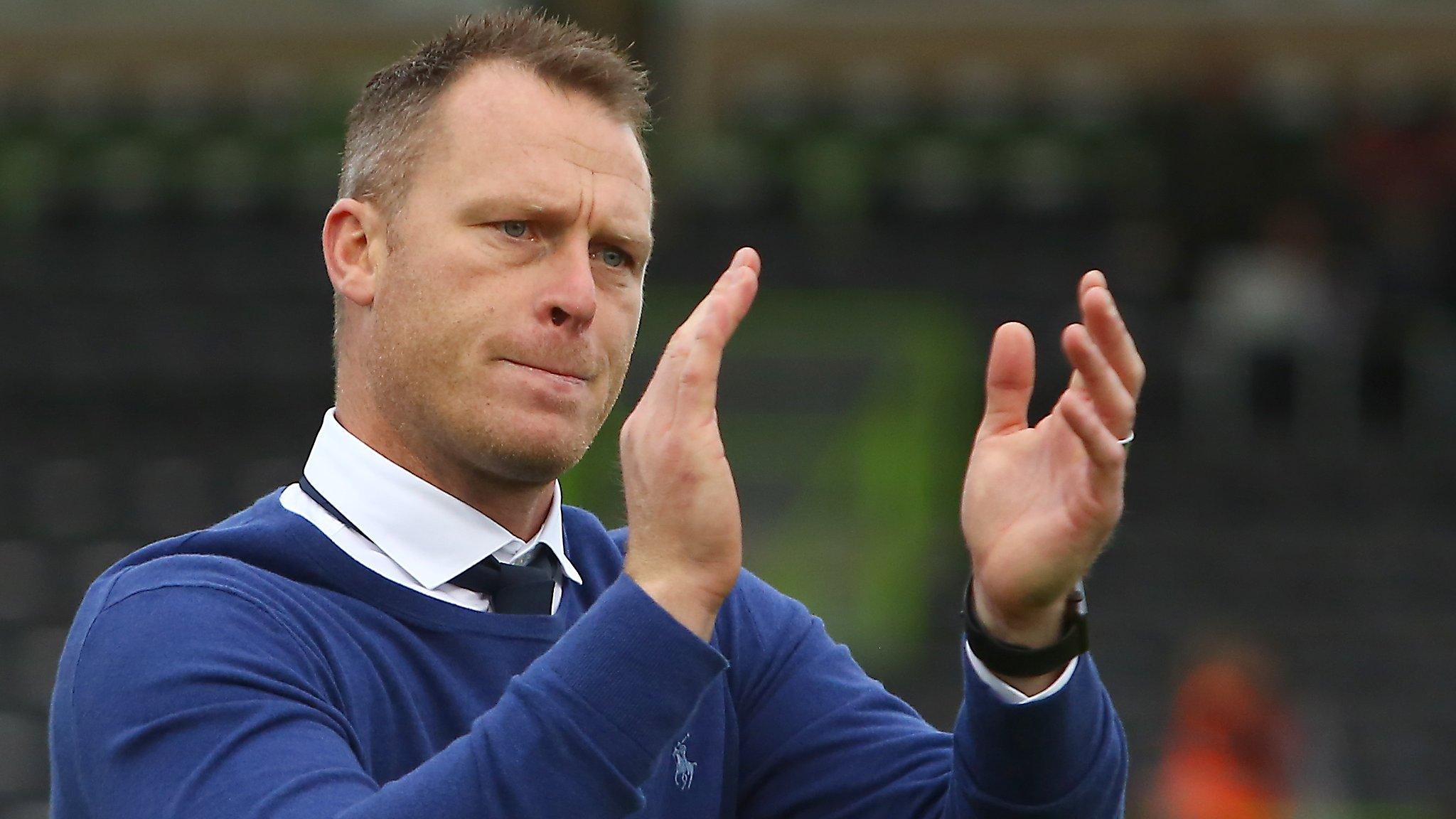 Mike Flynn applauds Newport's fans