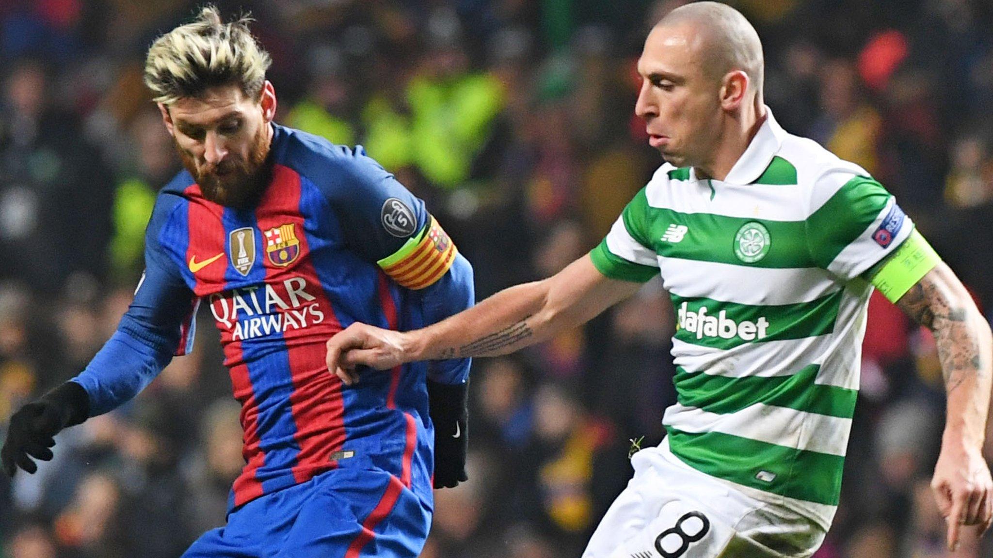 Celtic captain Scott Brown tackles Barcelona's Lionel Messi