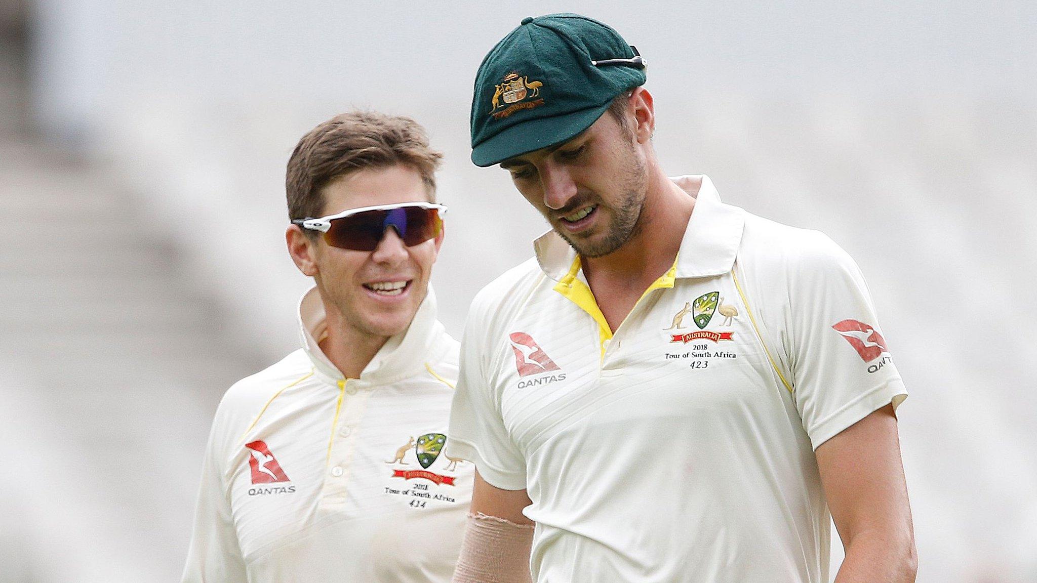 Australia captain Tim Paine (left) and bowler Pat Cummins