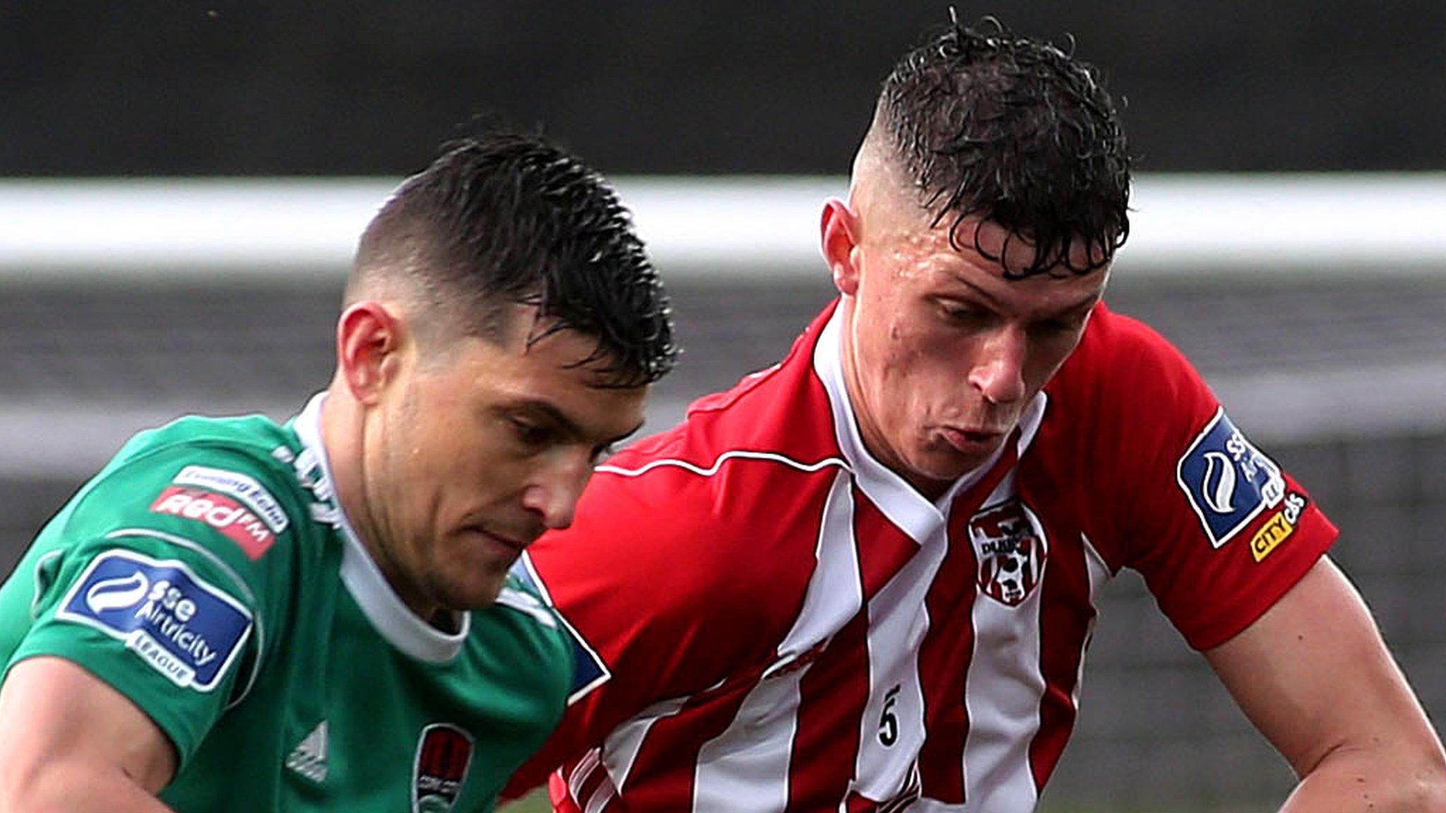 Cork's Graham Cummins battles with Derry's Eoin Toal at the Brandywell