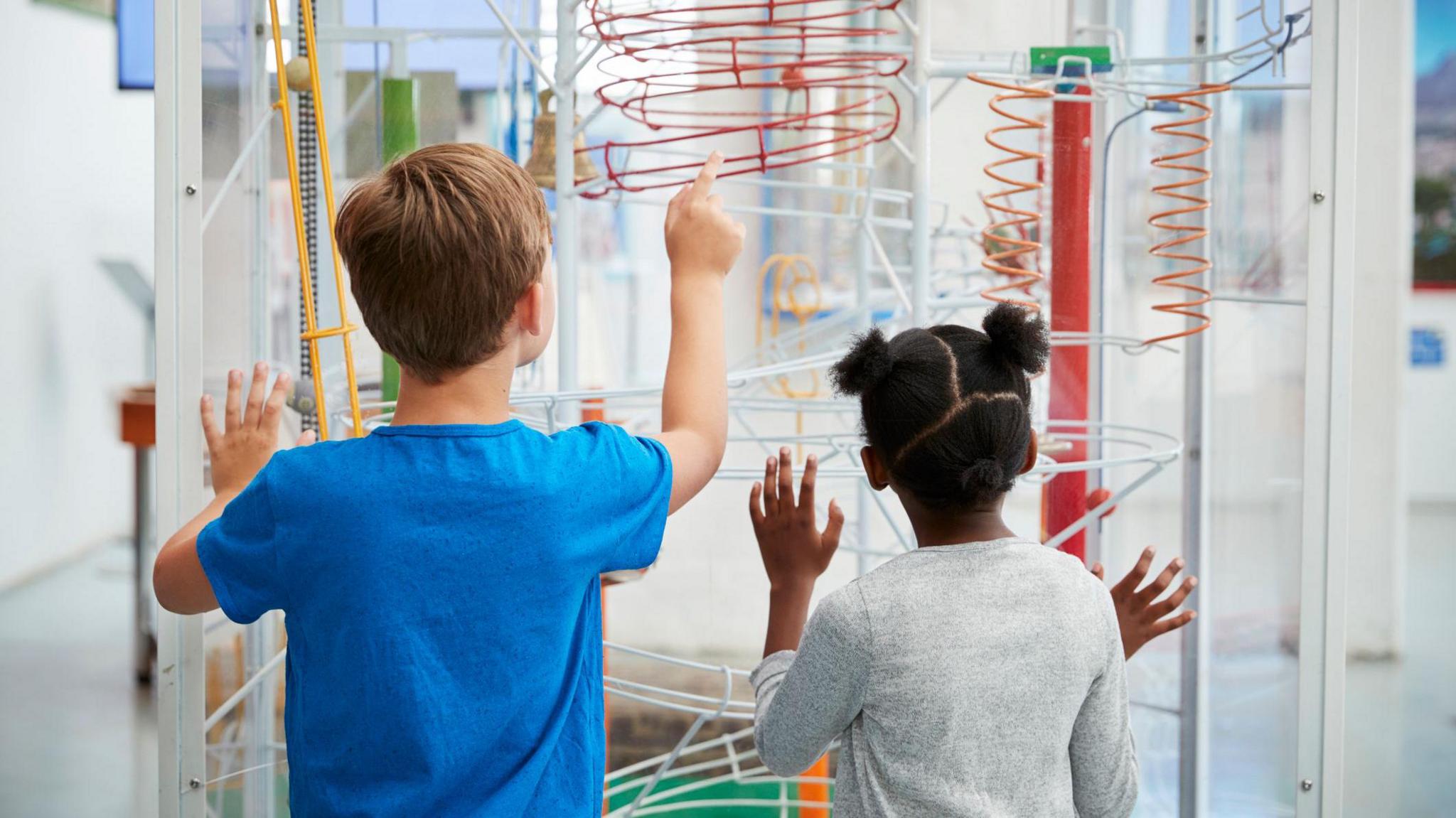 Two children at a museum