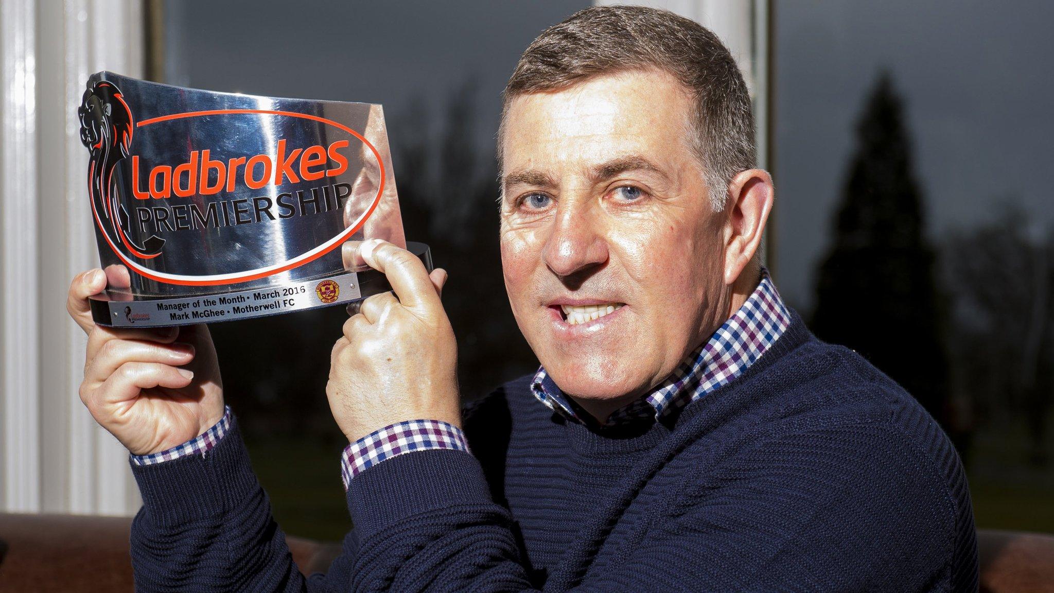 Motherwell manager Mark McGhee with his award