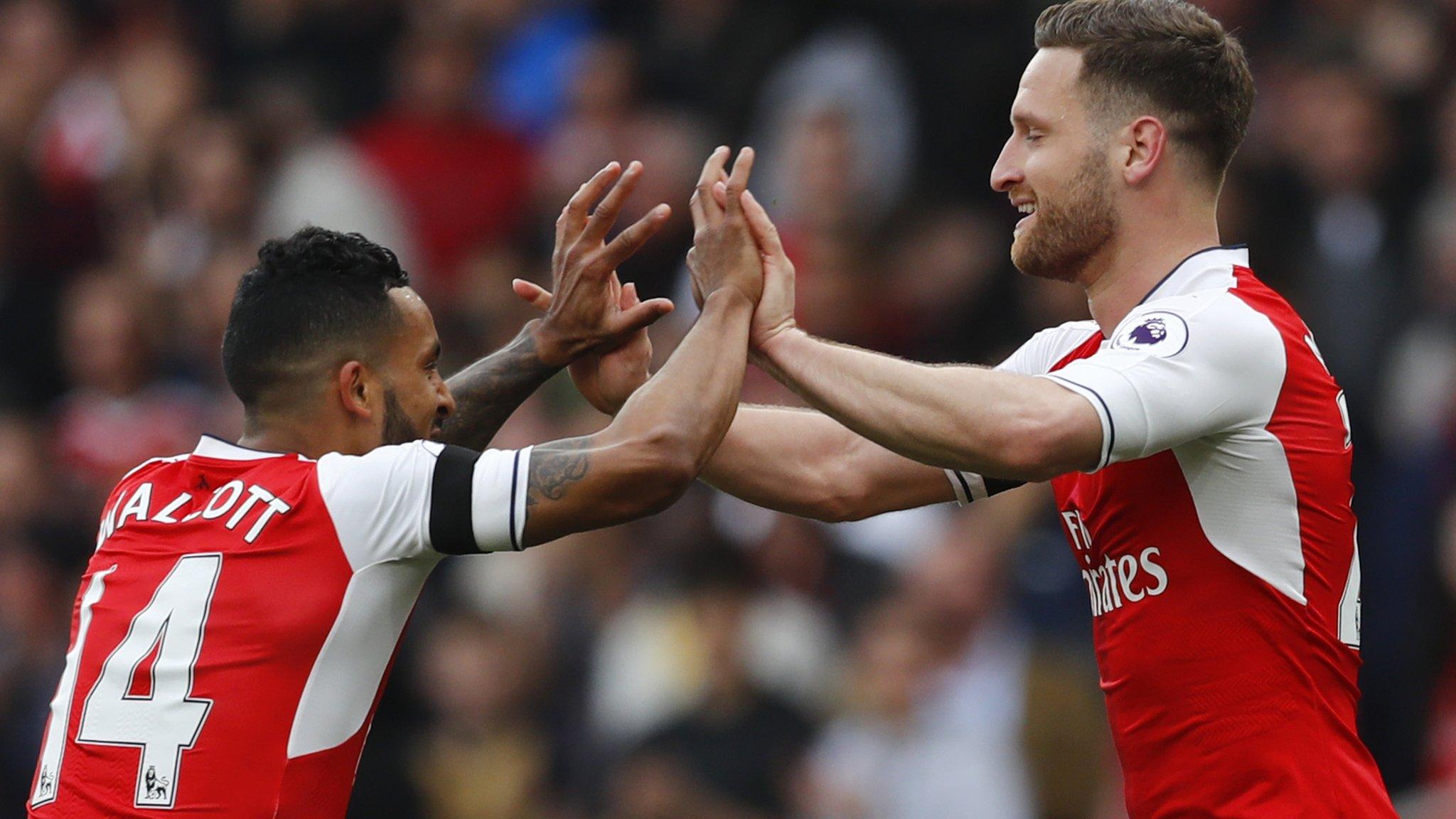 Arsenal forward Theo Walcott and defender Shkodran Mustafi