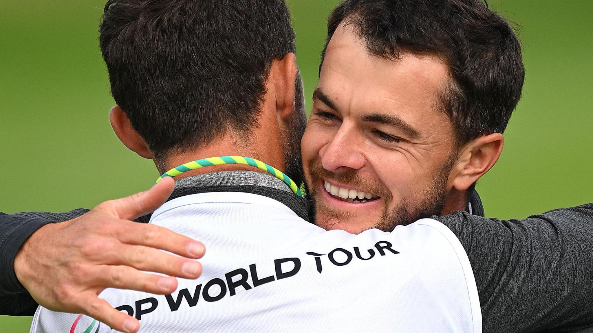 Laurie Canter hugs his caddie after winning the European Open in June 2024