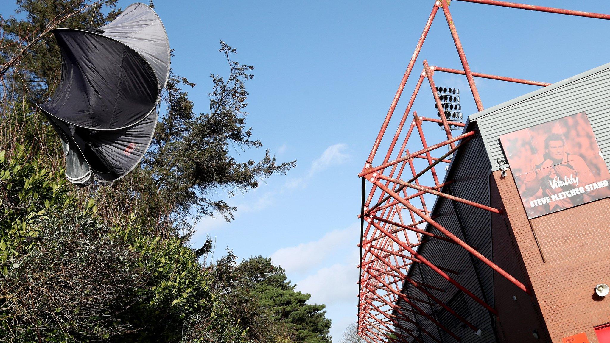 Signs of the effects of Storm Eunice outside Bournemouth's Vitality Stadium