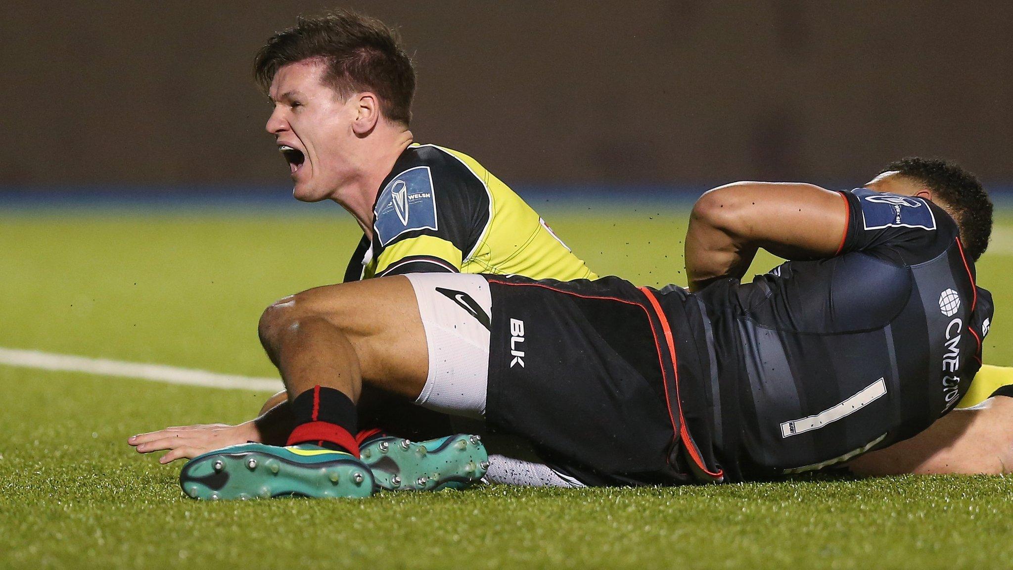 Freddie Burns celebrates try