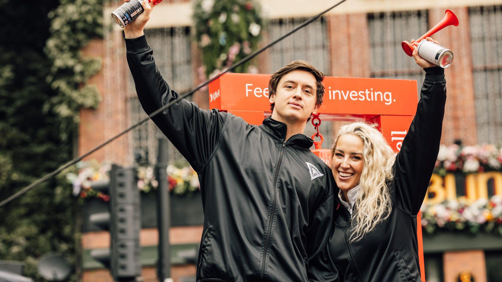 Sabre and Apollo, stars of the BBC's Gladiators, pictured holding horns in the air ahead of the start of the junior races at the Great North Run last month  