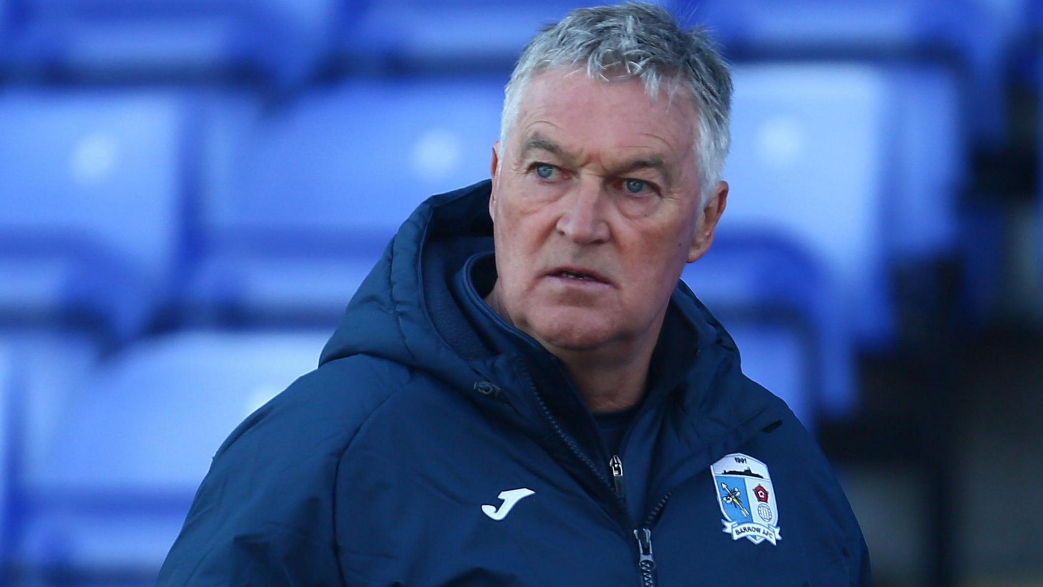 Rob Kelly wearing a Barrow jacket during his spell in caretaker charge